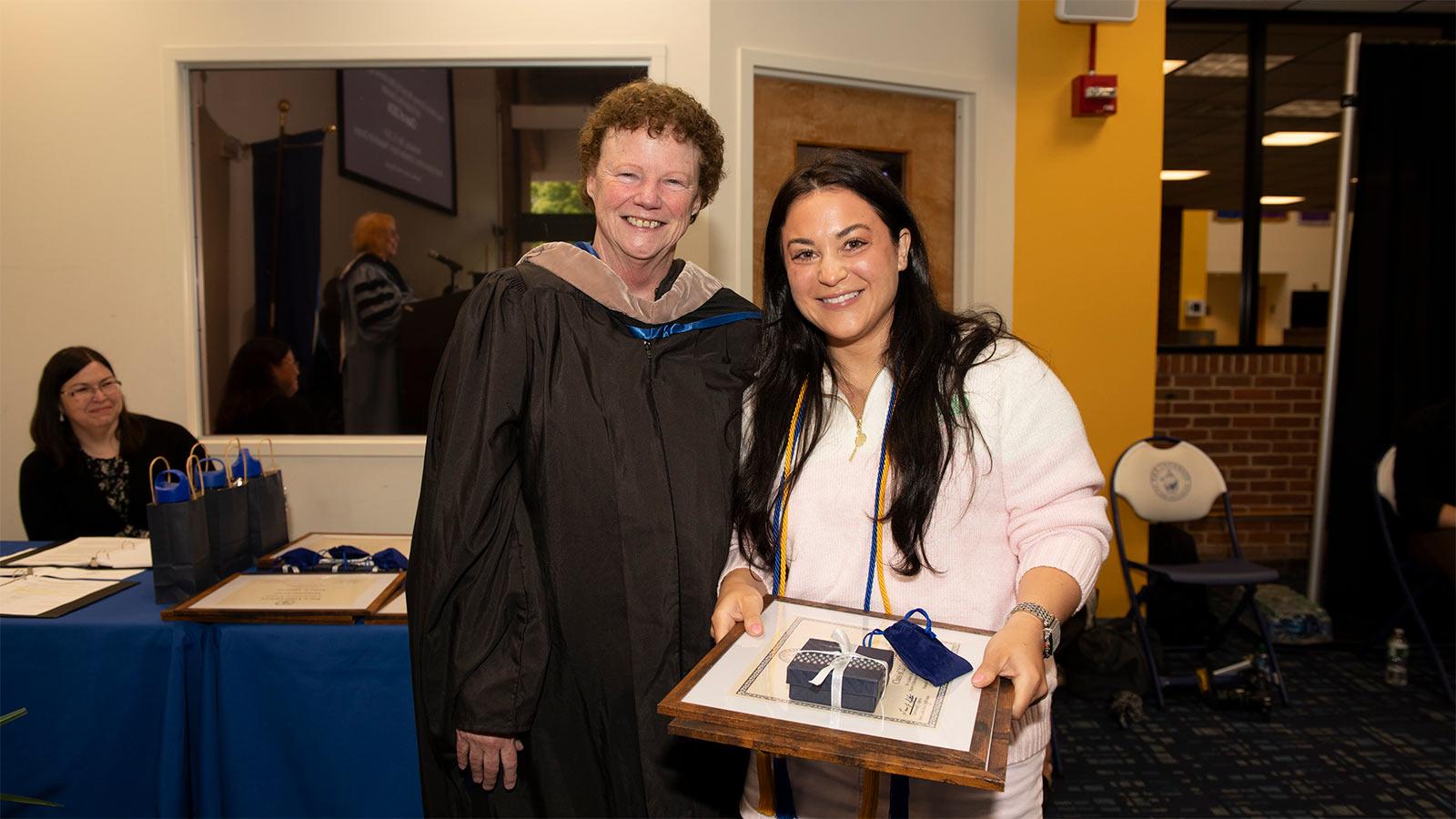 Pace University Lubin Dean Eileen Murphy with Laura Antonucci accepting an award.