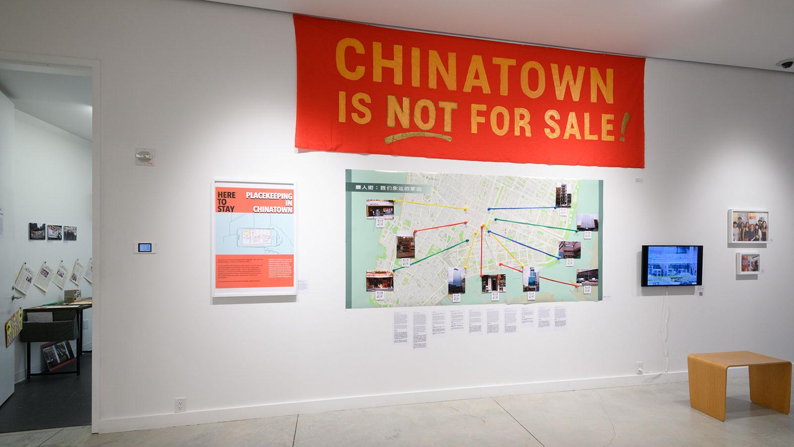 Artwork on display by the Chinatown Art Brigade in the "Degentrification Archives" exhibition at the Pace University Art Gallery.