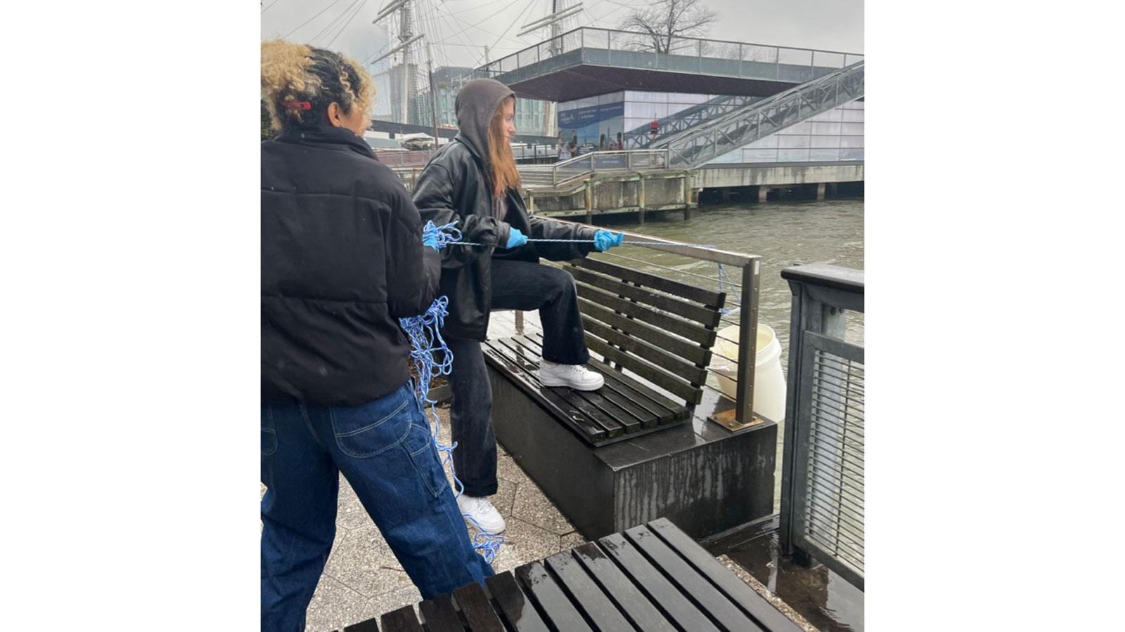 Pace University Environmental Studies and Science students collect water samples in Gotham Park for analysis.