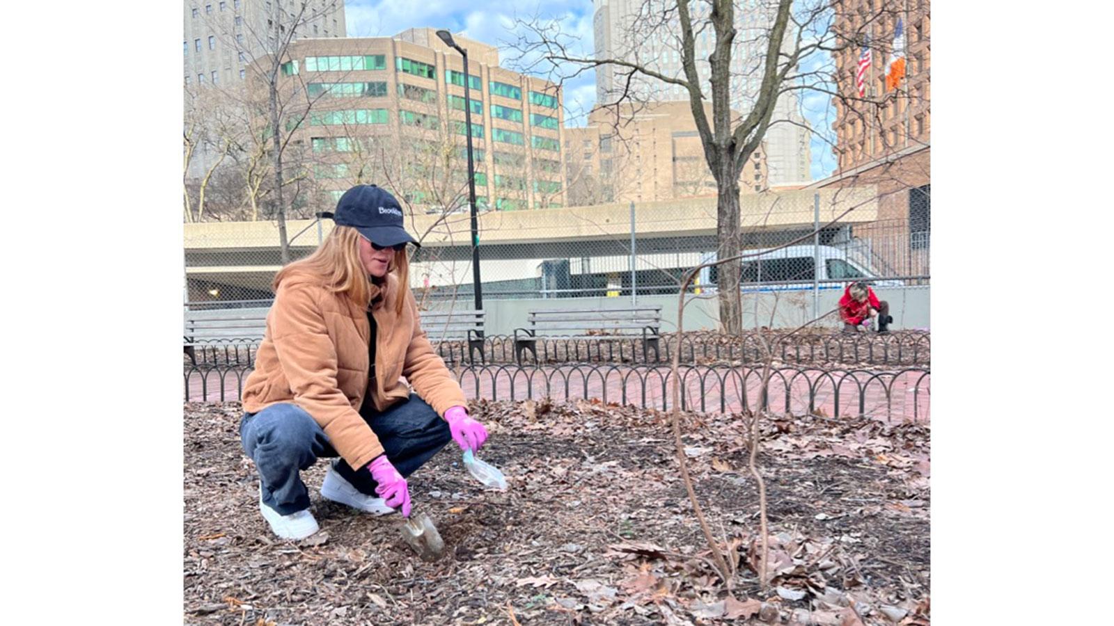 Pace University Environmental Studies and Science students collect soil samples in Gotham Park for analysis.