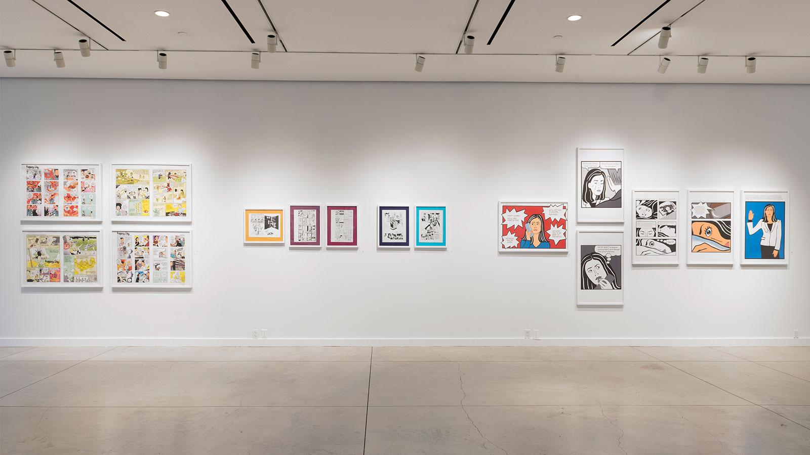 Artwork from various artists on display in the "Journey Illustrated" exhibition at the Pace University Art Gallery.