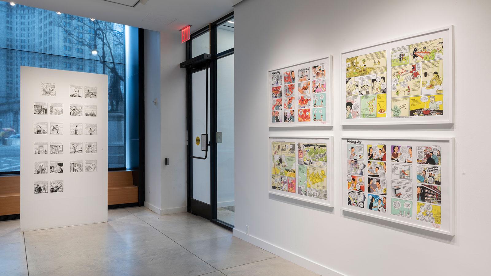 Artwork from various artists on display in the "Journey Illustrated" exhibition at the Pace University Art Gallery.
