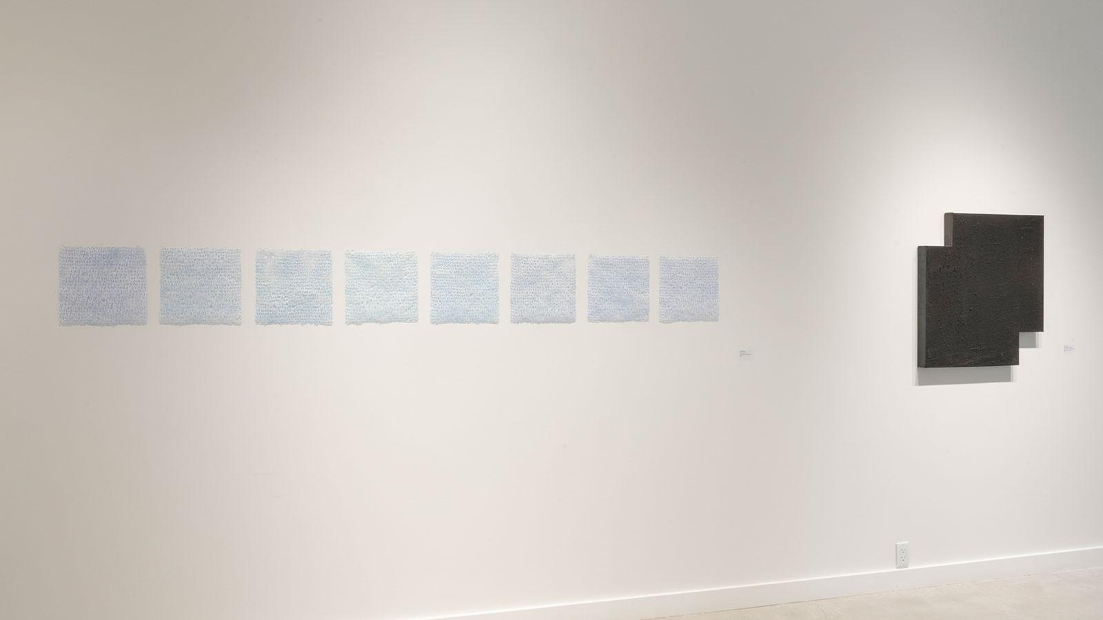 Artwork on display by various abstract artists in the "Substance" exhibition at the Pace University Art Gallery.