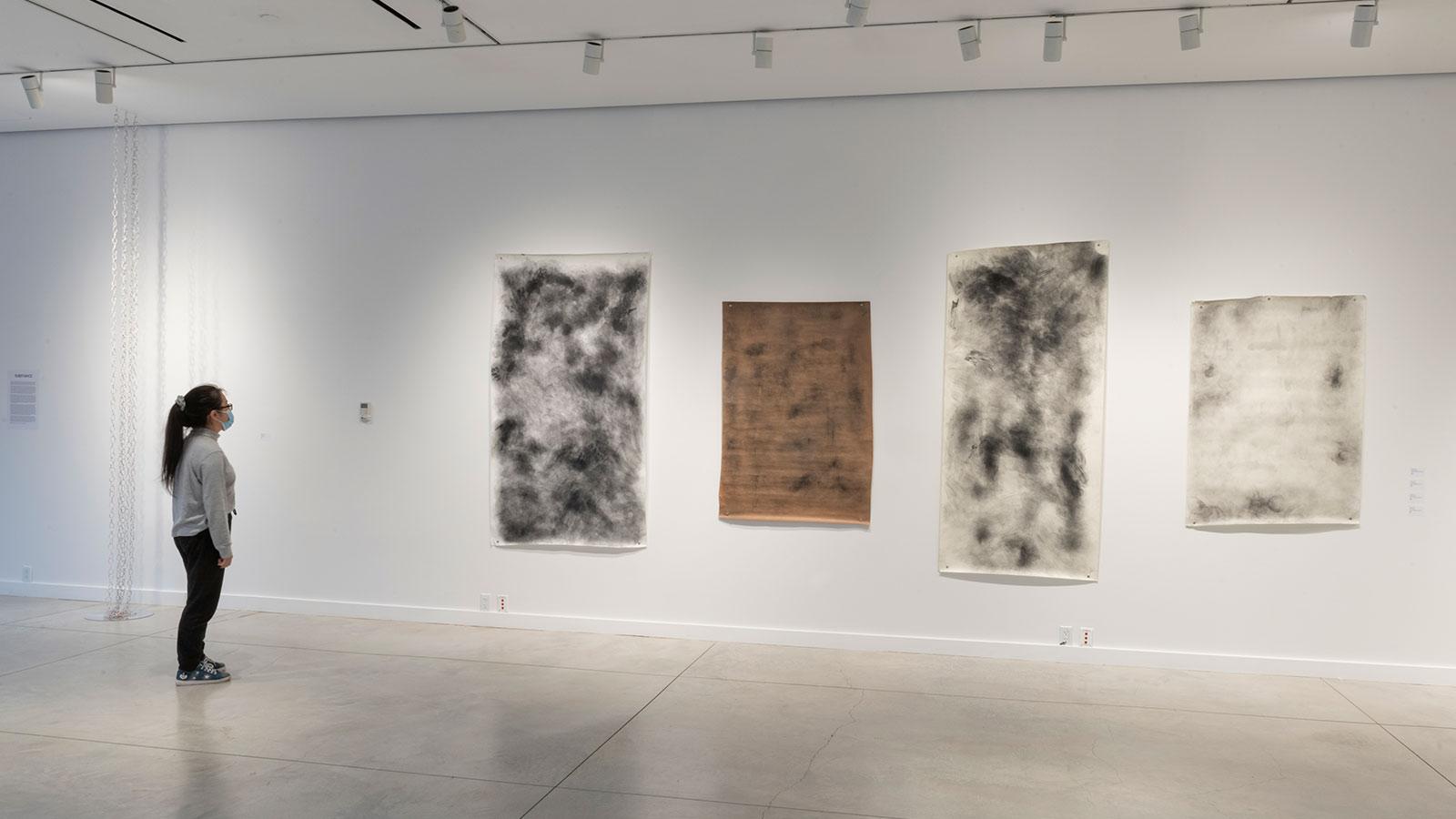 Artwork on display by various abstract artists in the "Substance" exhibition at the Pace University Art Gallery.
