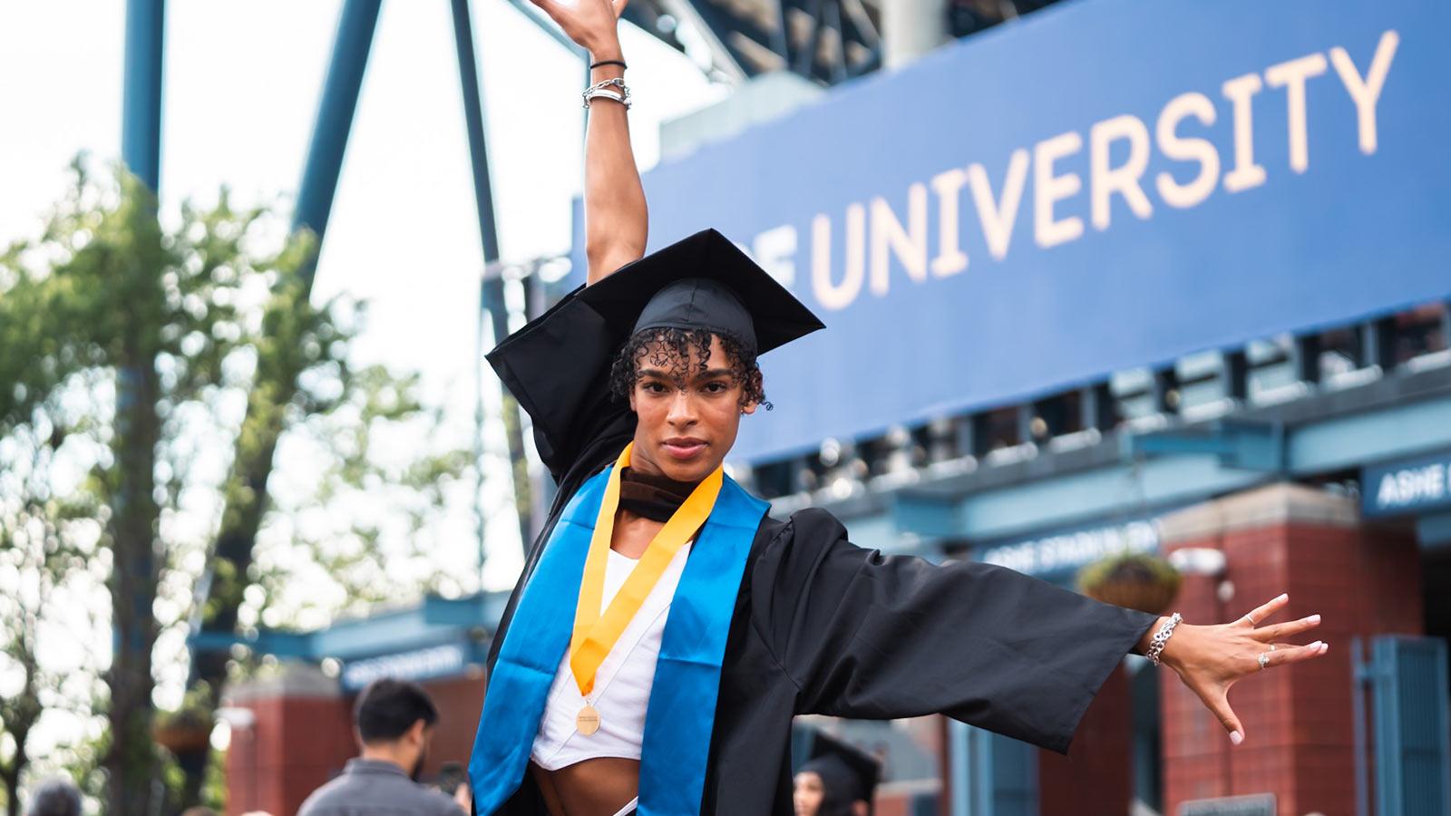 Pace grad posing at Commencement. 