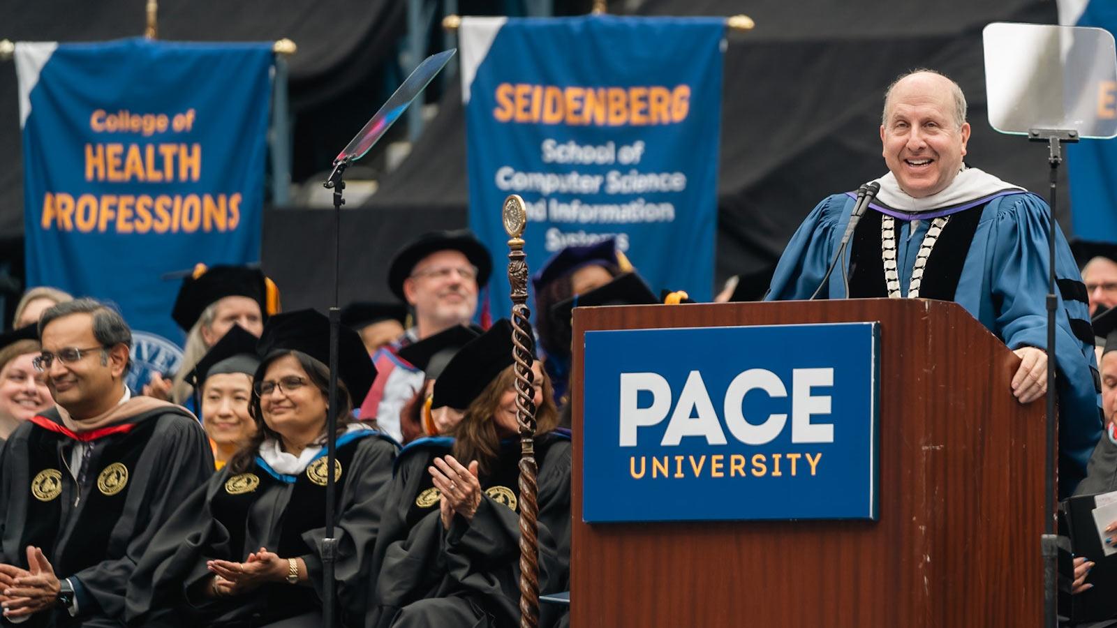 President Krislov addressing the graduates at Commencement. 