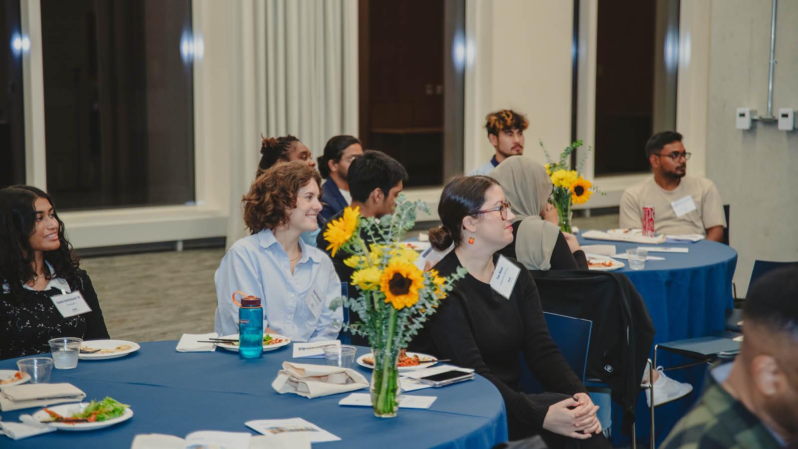 Audience listening to 2024 Wilson Center intern presentations