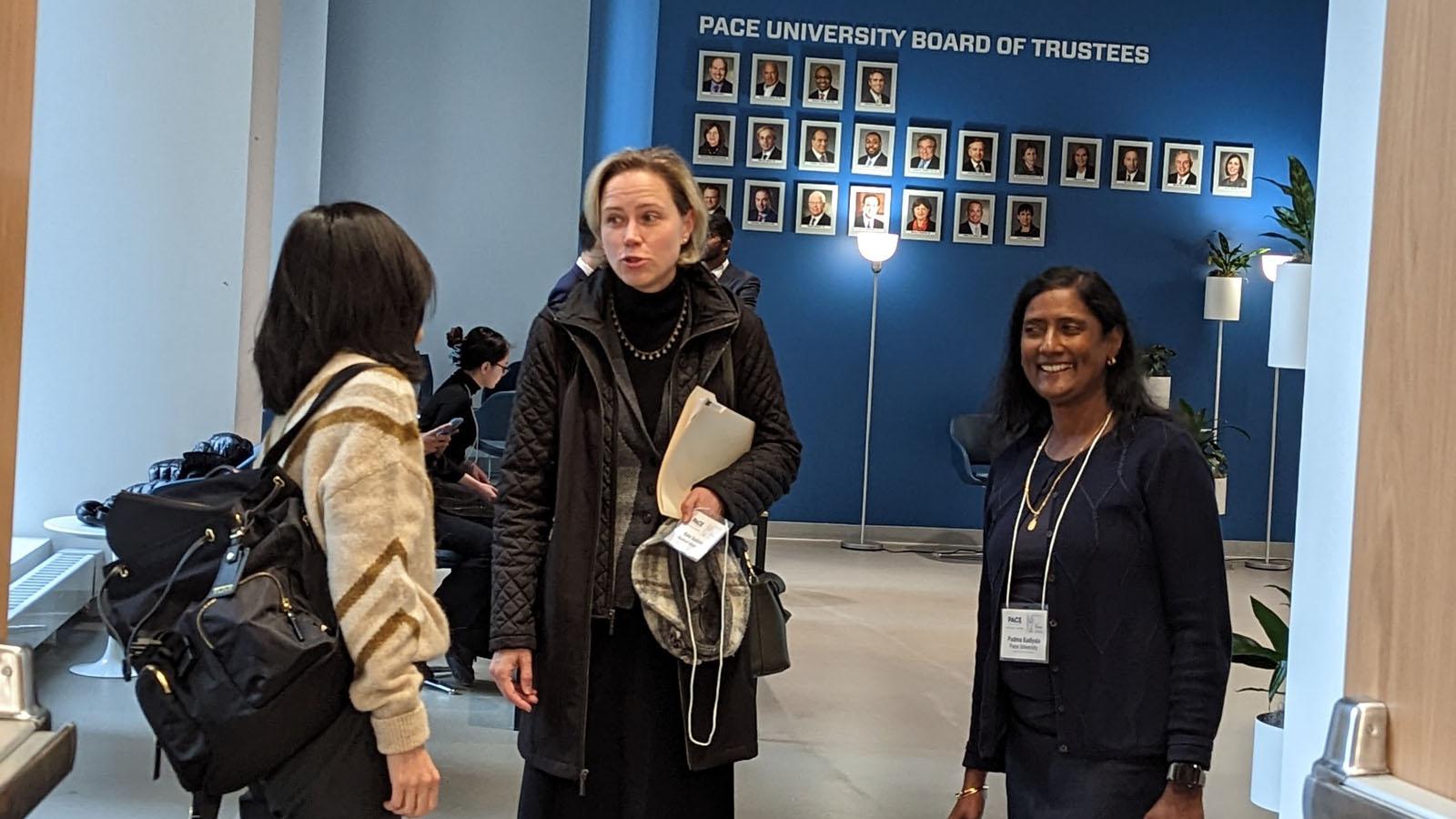 Attendees catching up at the 2023 Friends of Women in Finance Symposium-Greater New York (FWFS-GNY) at Pace University