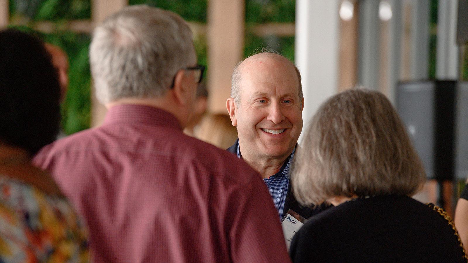 Pace alumni meeting for a regional programming brunch in Fort Lauderdale.