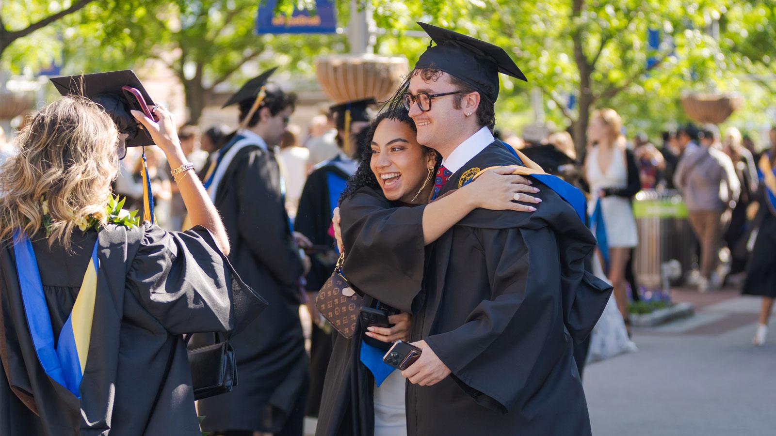 Graduates posing for the camera.