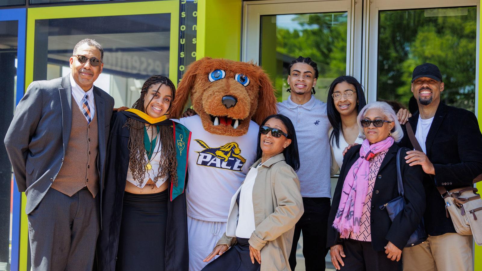 Graduates posing for the camera.