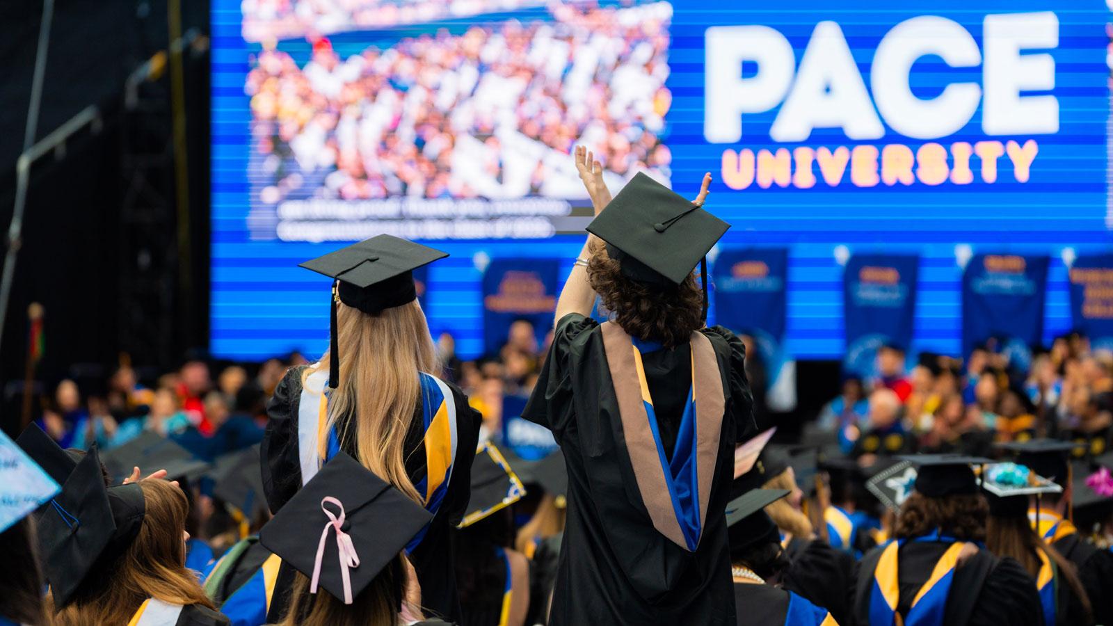 Graduates standing in USTA.