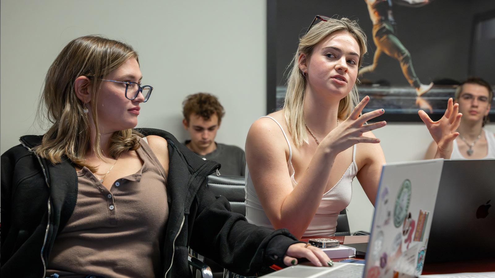 Sands student talking in a production meeting.