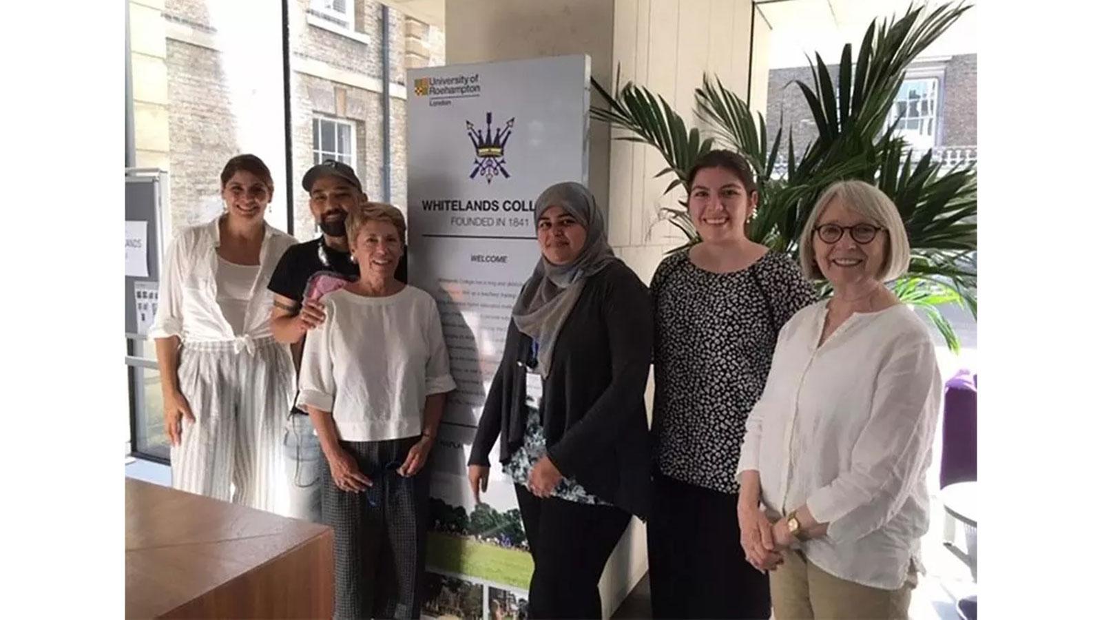 Pace University Psychology Parent Child Institute team members standing together at an international conference in London