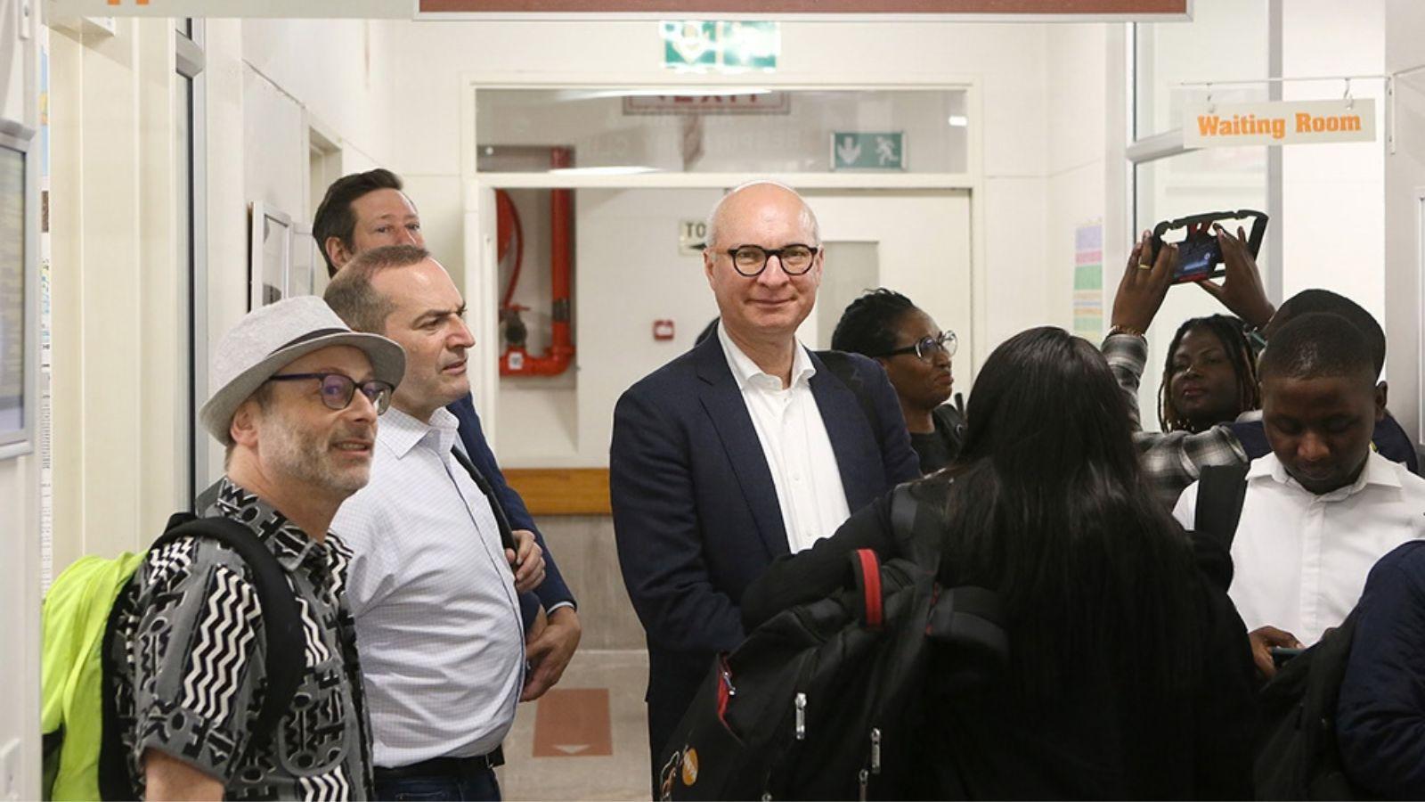 José Luis Castro greeting attendees at an event during the workshop in South Africa