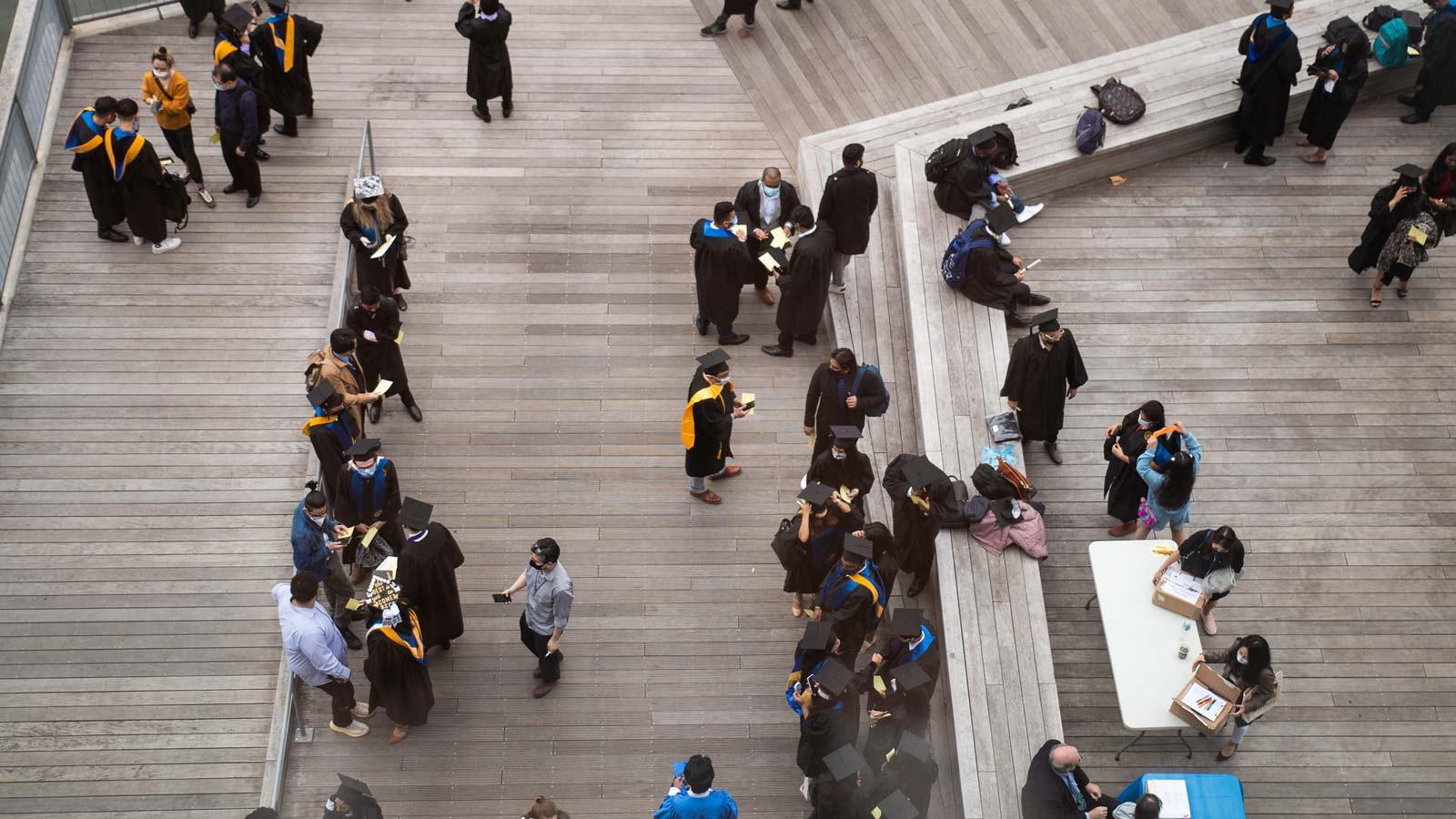 overhead shot of people on a pier