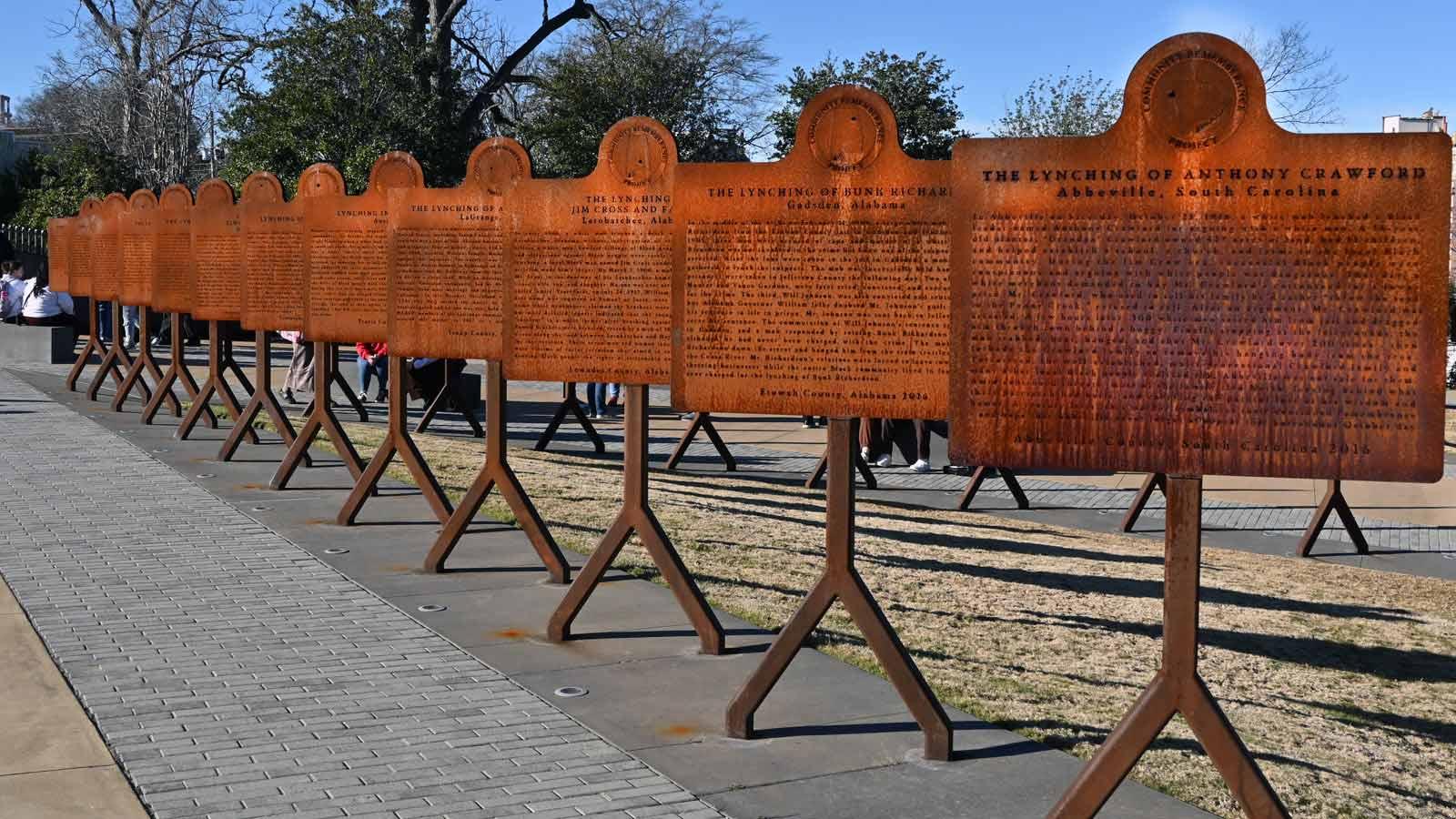 art installation of rusted plaque memorials.
