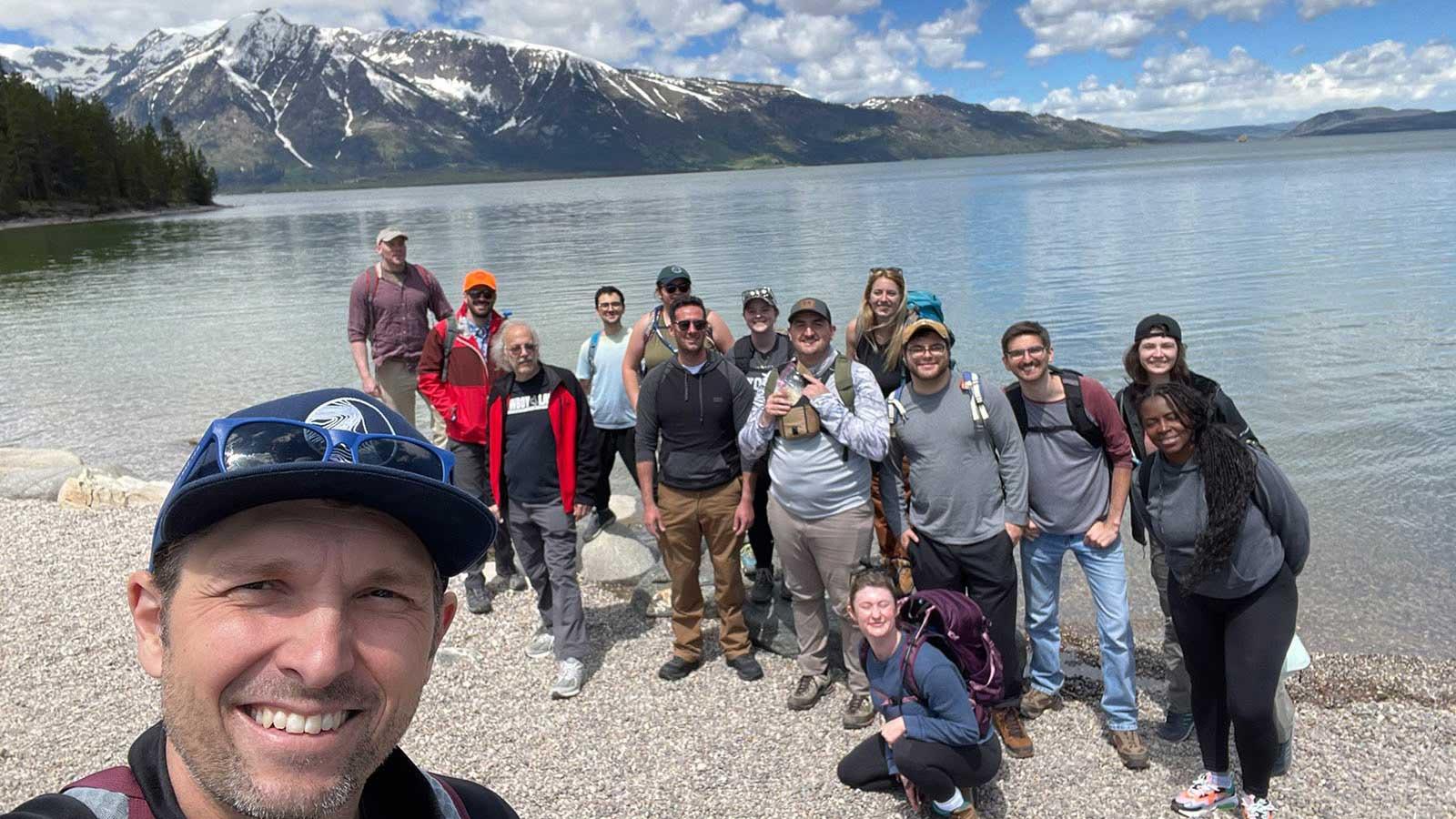Elisabeth Haub School of Law professor and students taking a group selfie on the beach