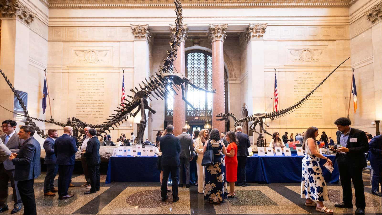 Wide shot of guests at the 2026 Spirit of Pace Awards cocktail hour at AMNH