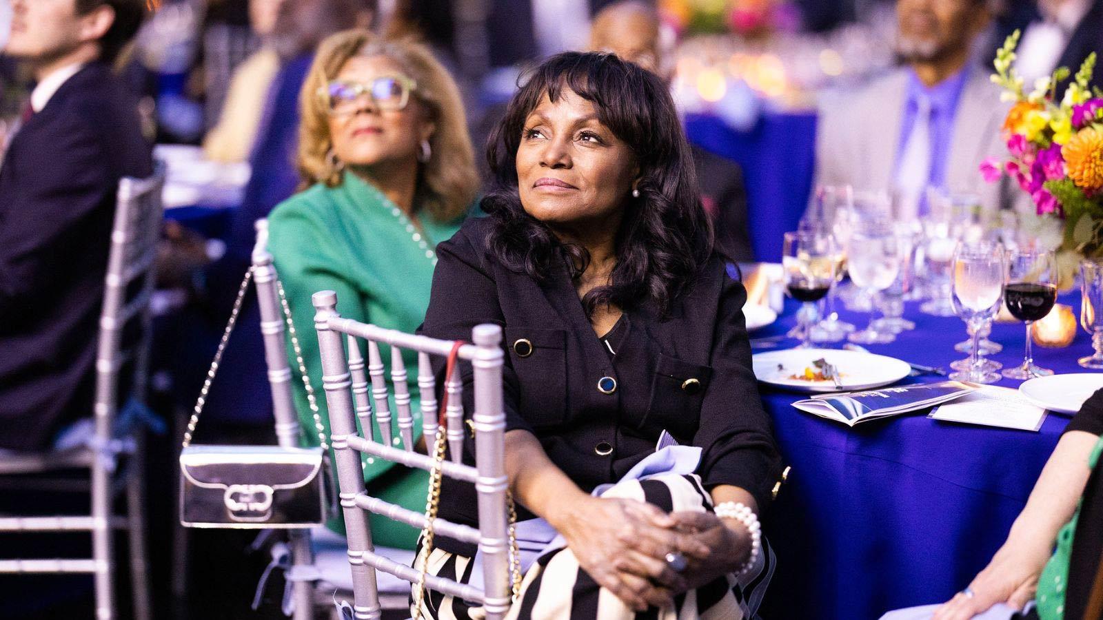 A guest looks on with a smile during the presentation at the 2026 Spirit of Pace Awards dinner.