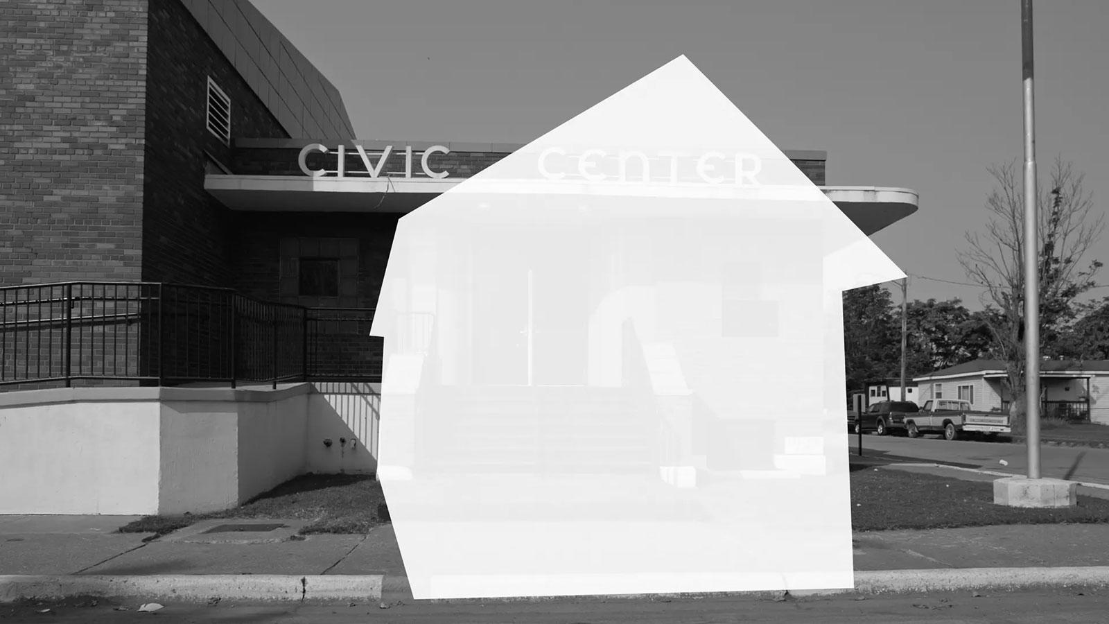 Monochromatic photo of a civic center overlayed with a white house shape by Wendel White