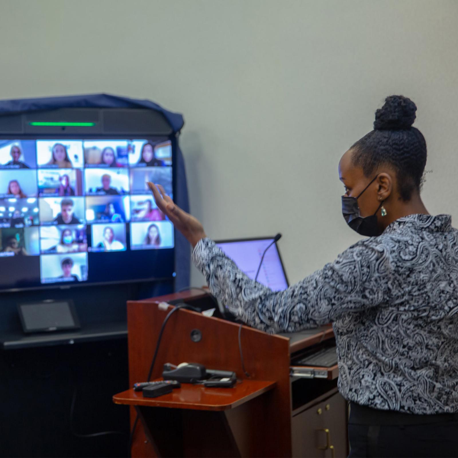 Students at a Zoom clasroom meet.