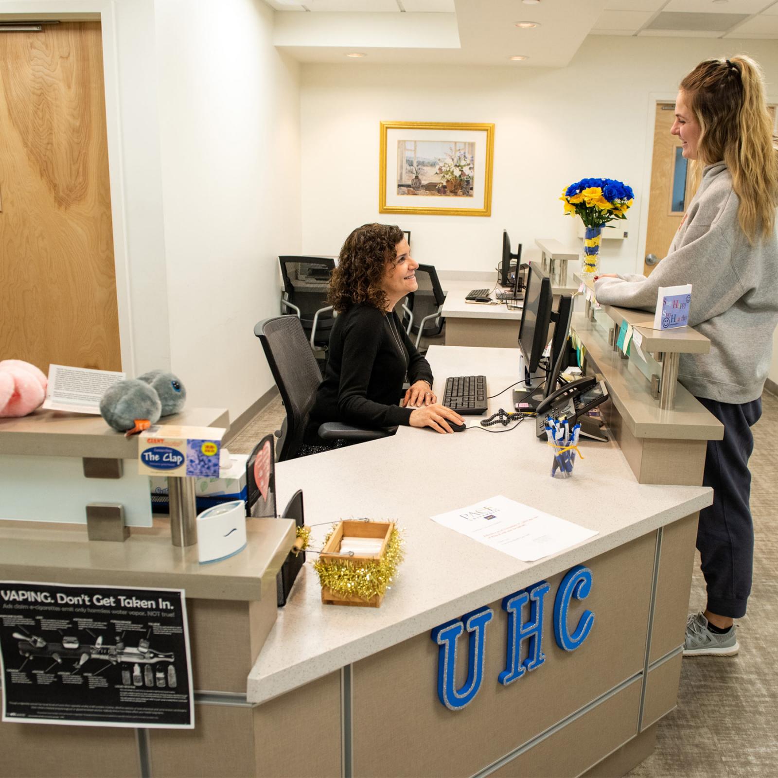 two people in the University Health Care center