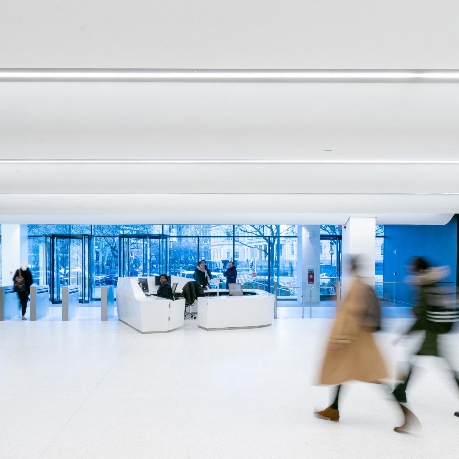 Students walking inside 1 Pace Plaza.