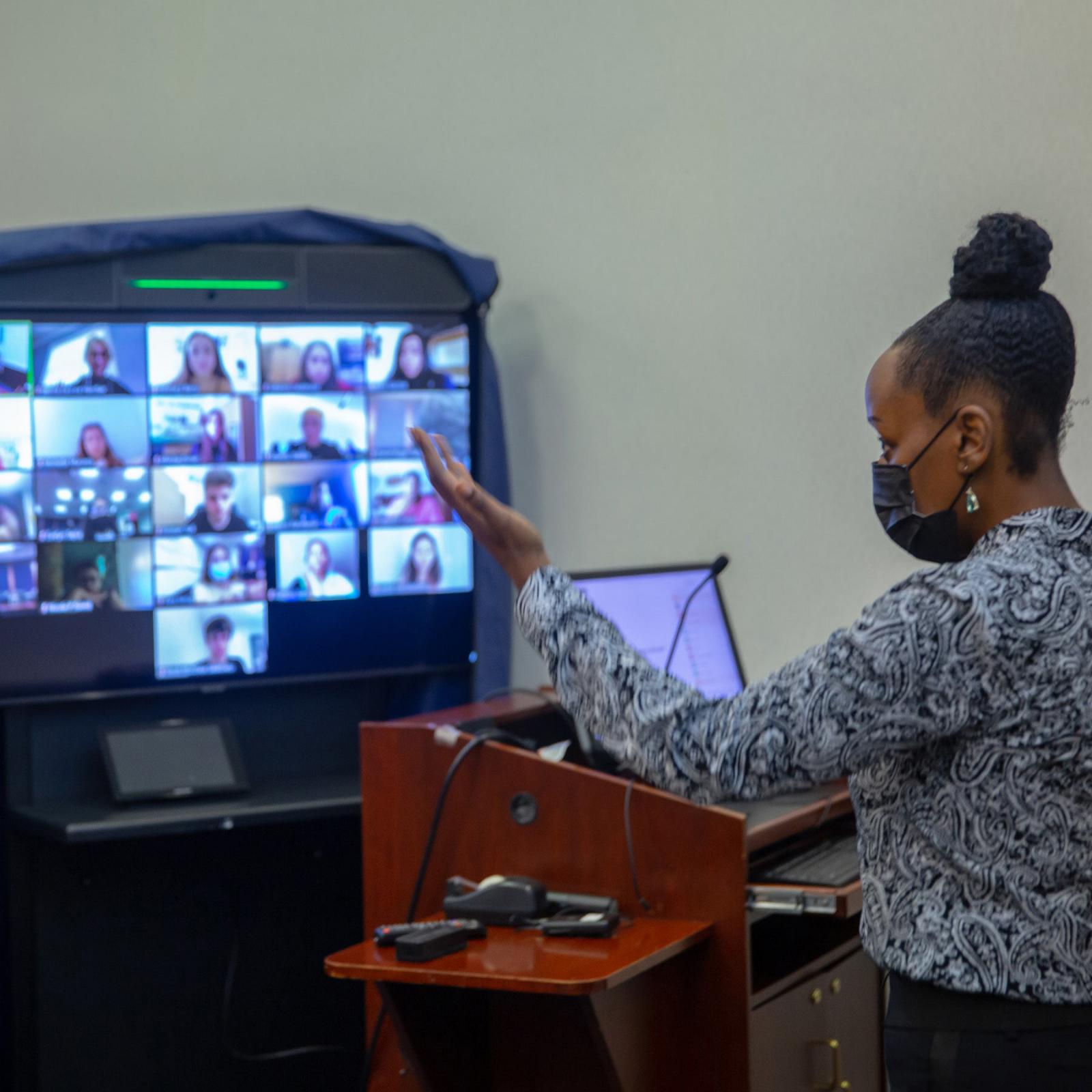 Faculty member teaching a class via Zoom.