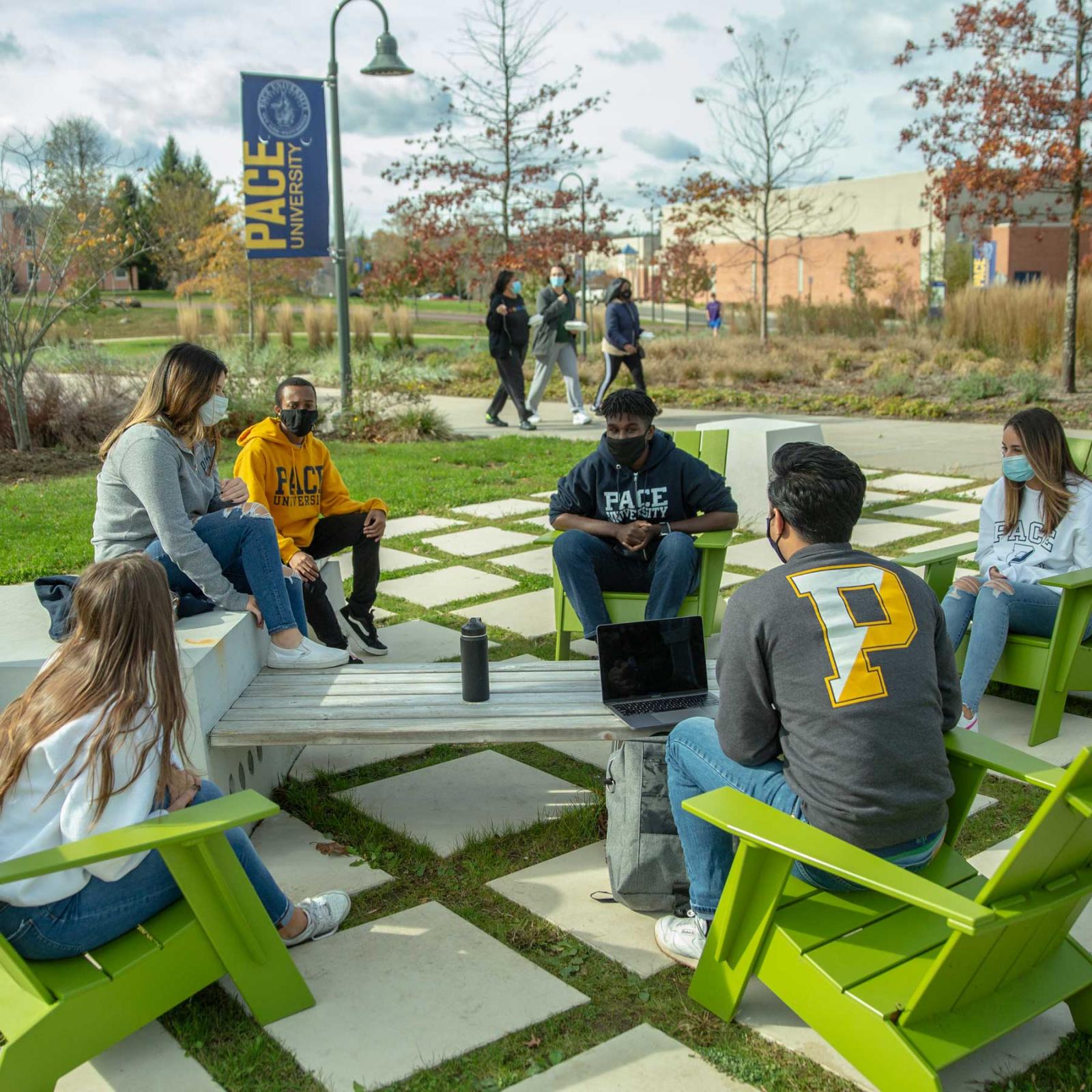 group of students in masks on the pleasantville campus