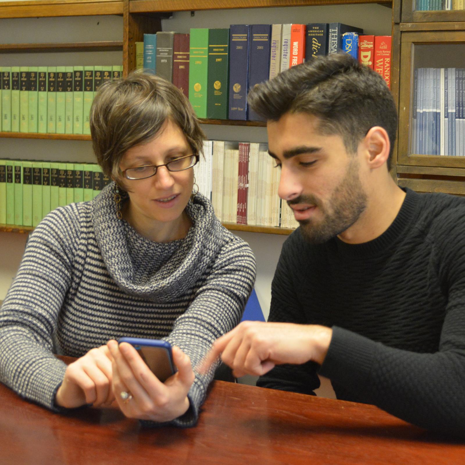 Faculty working with a student on a project