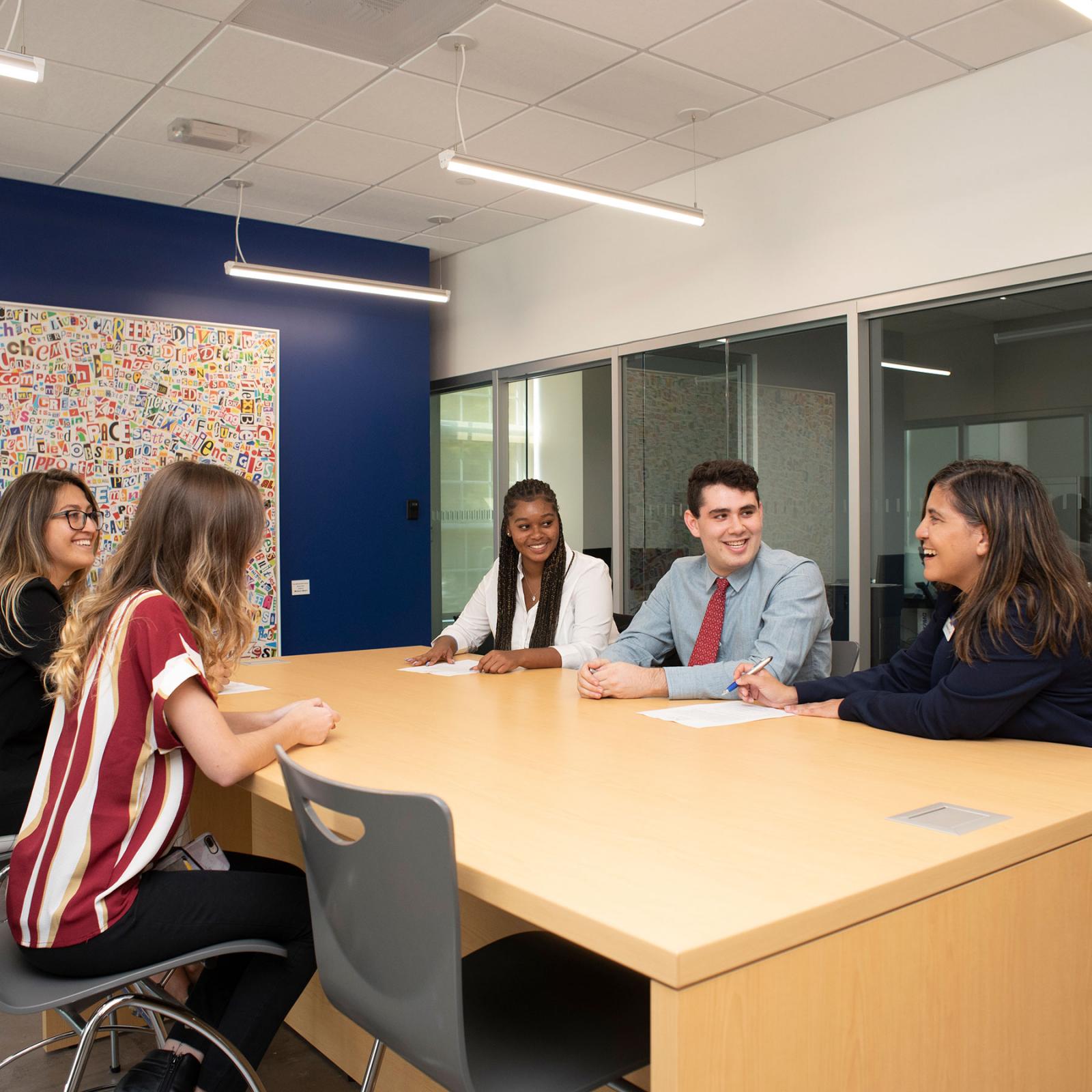 Students meeting with a Career Services advisor.
