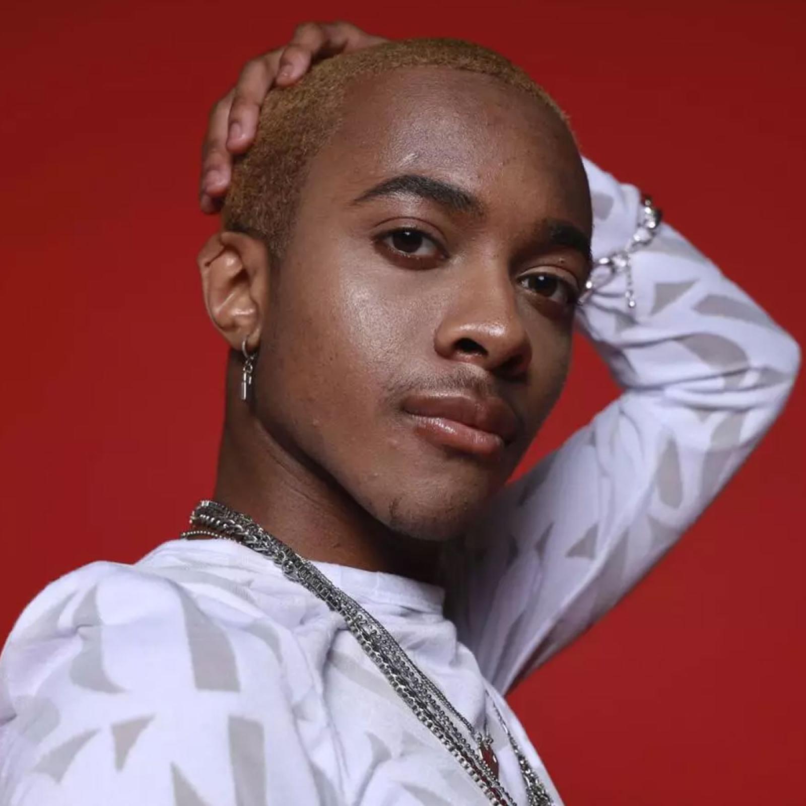 young man against red background