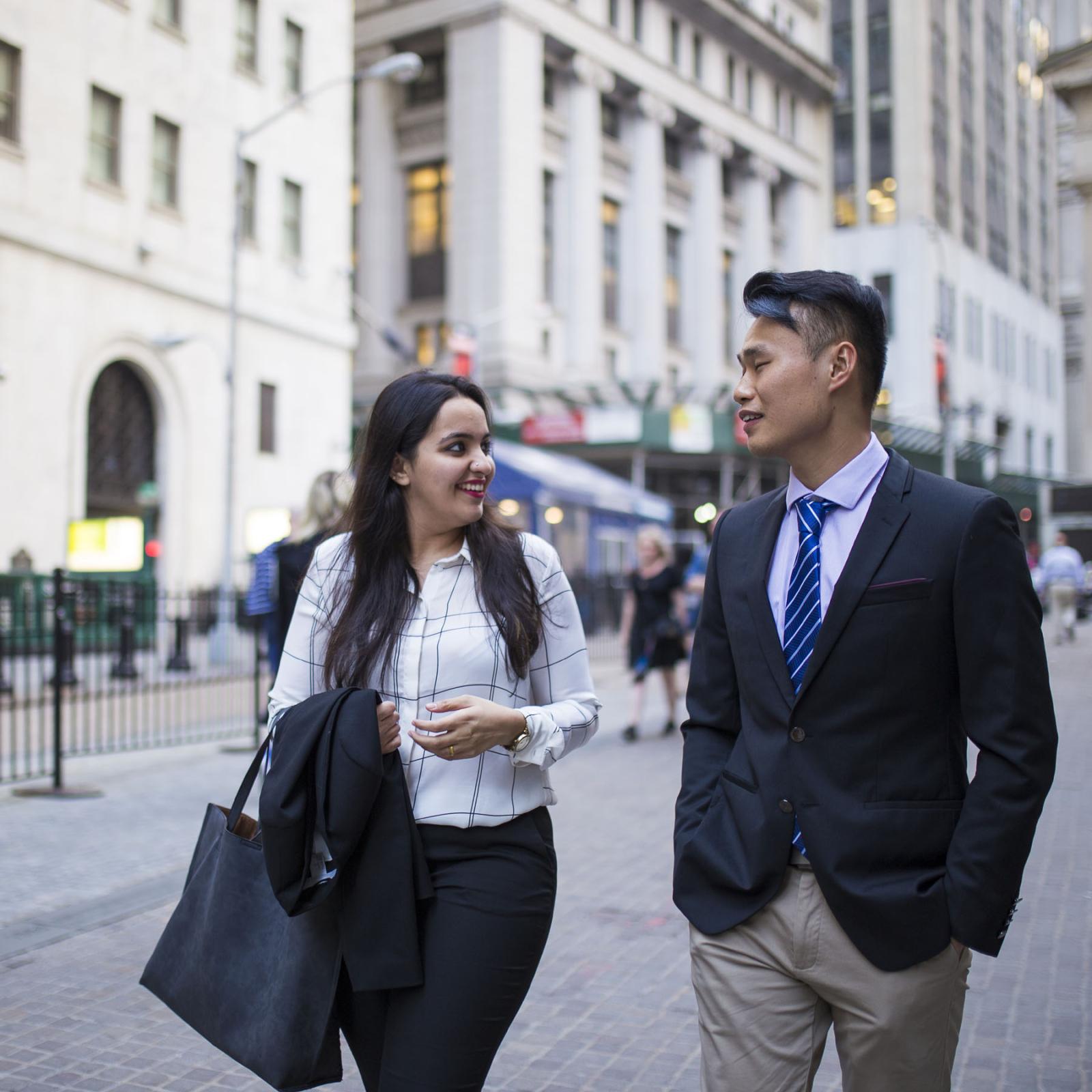 two Lubin graduate students walking in Lower Manhattan near the New York City Campus