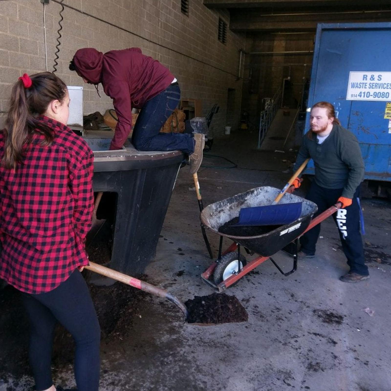 Students composting waste 