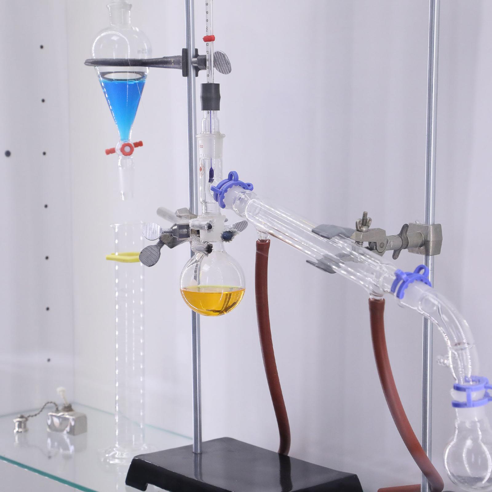 Beakers and tubes under a hood in a lab