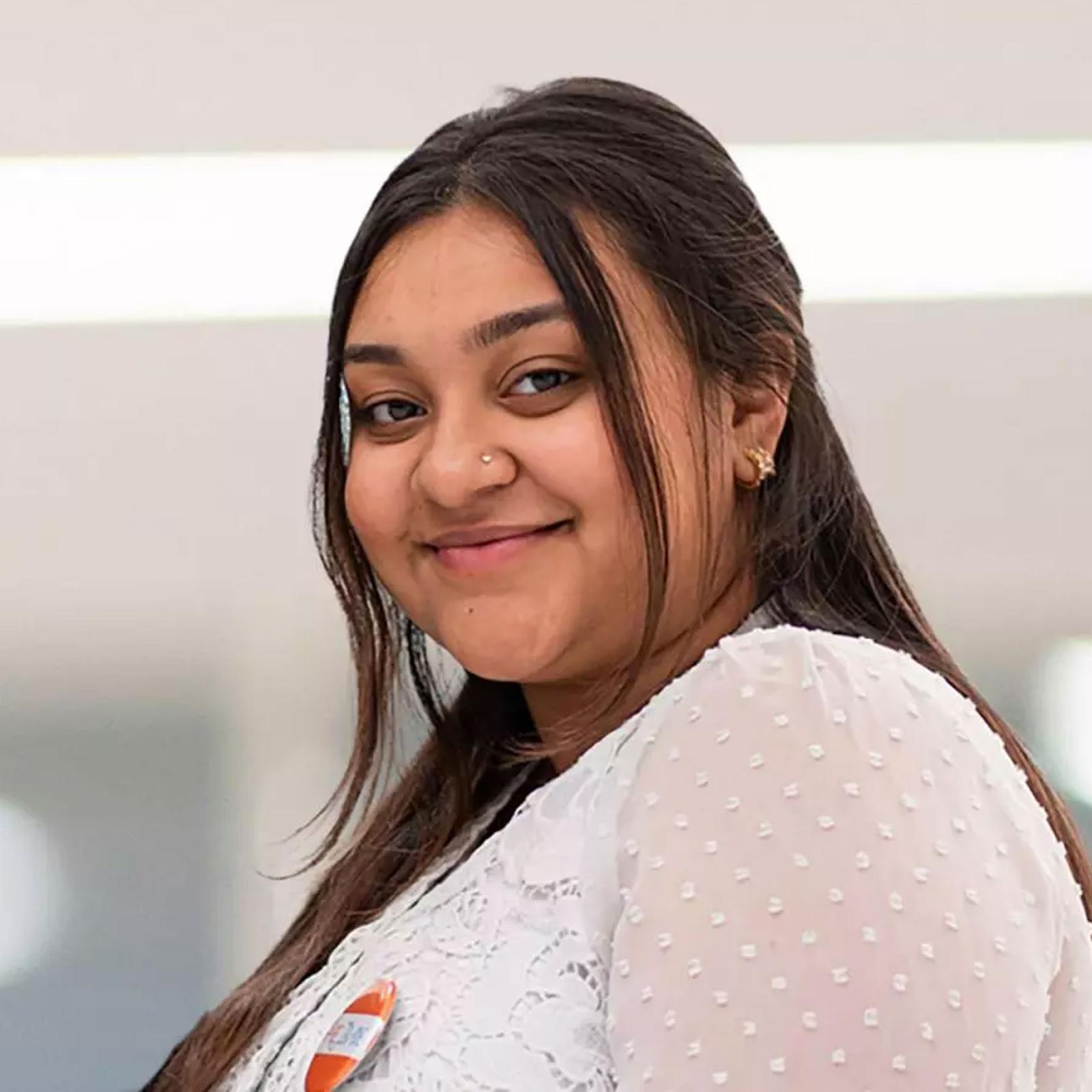 young woman smiling at the camera