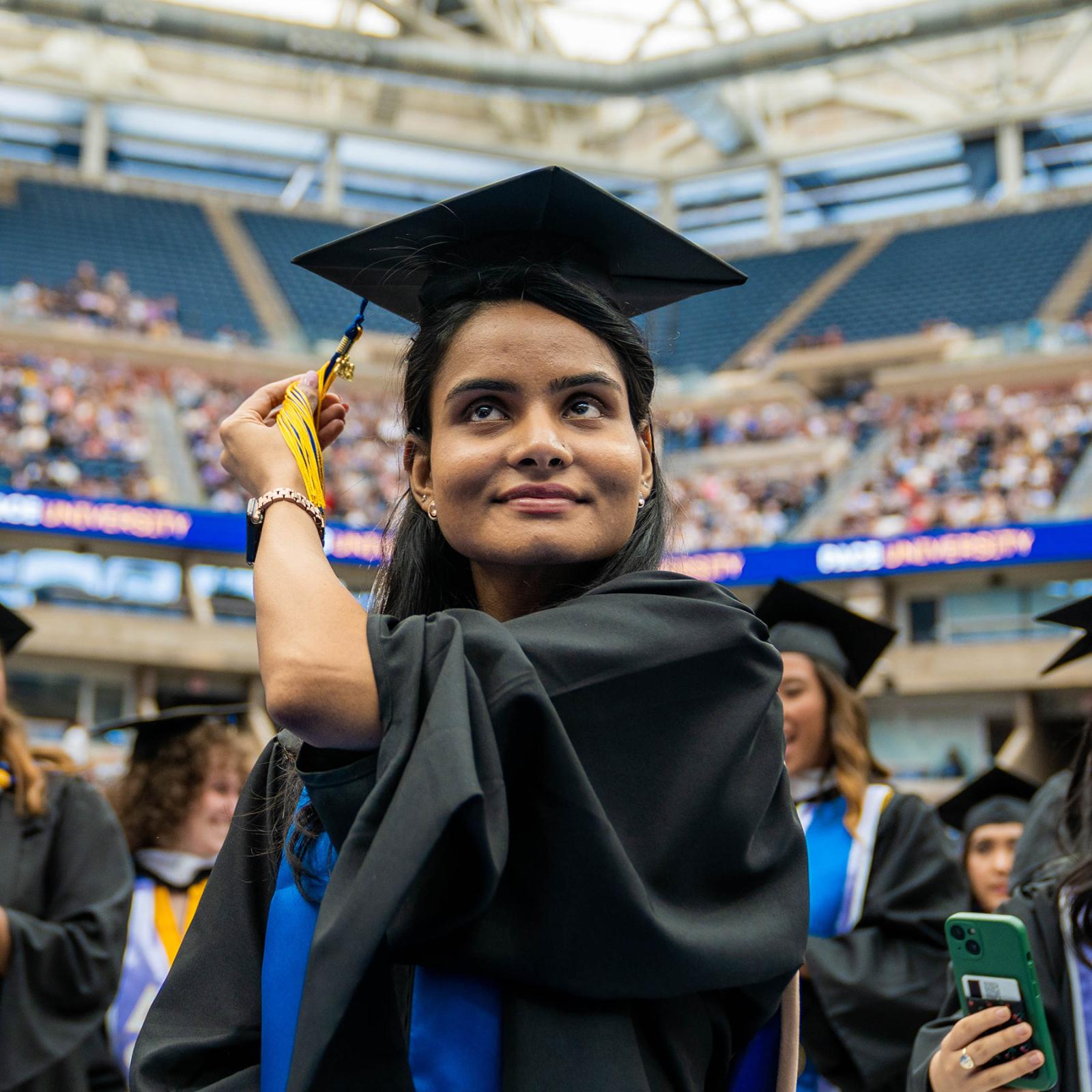 Pace student graduating at her Commencement ceremony.