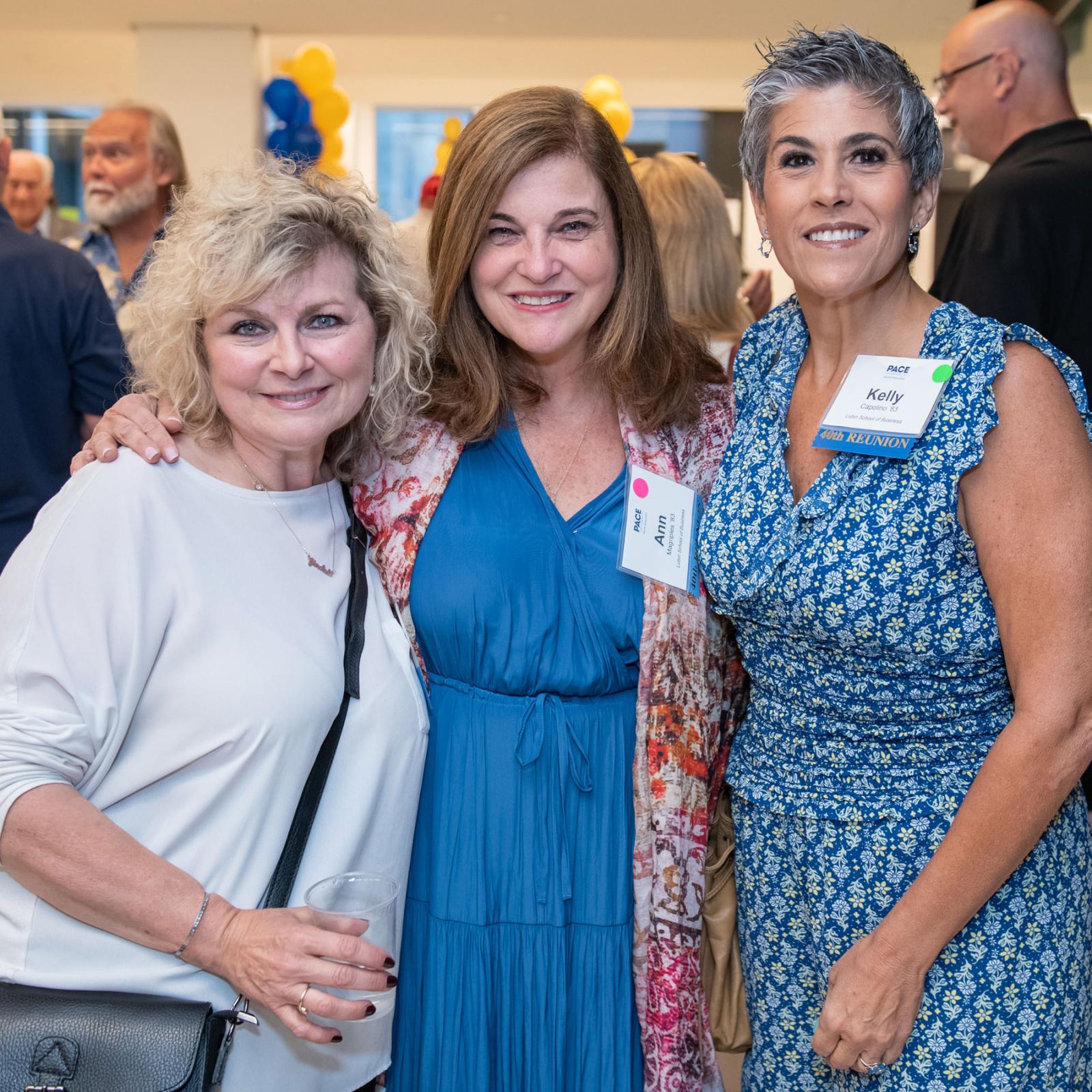 three pace alumna posing for the camera