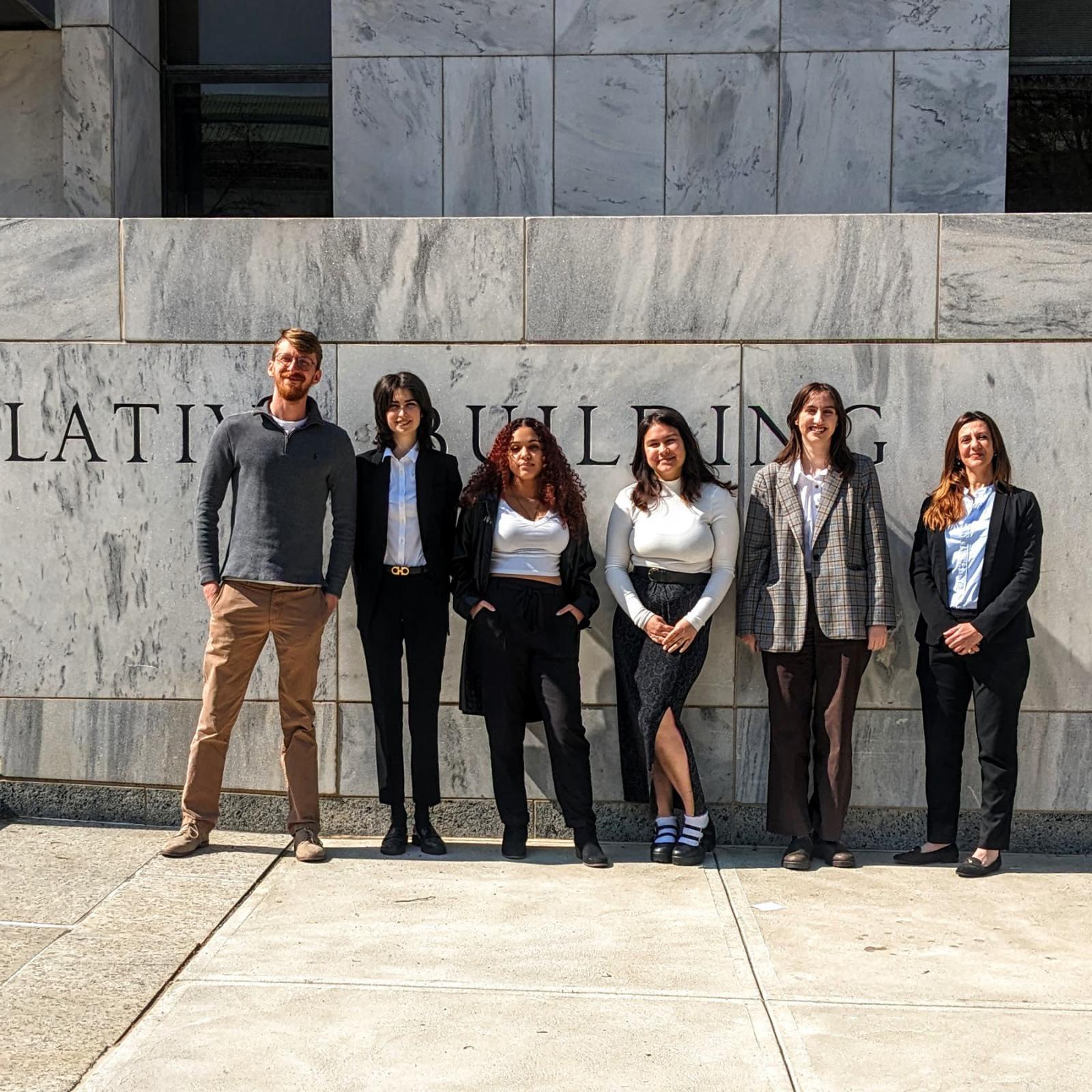 Pace University Animal Policy Project students standing outside the Legislative Building