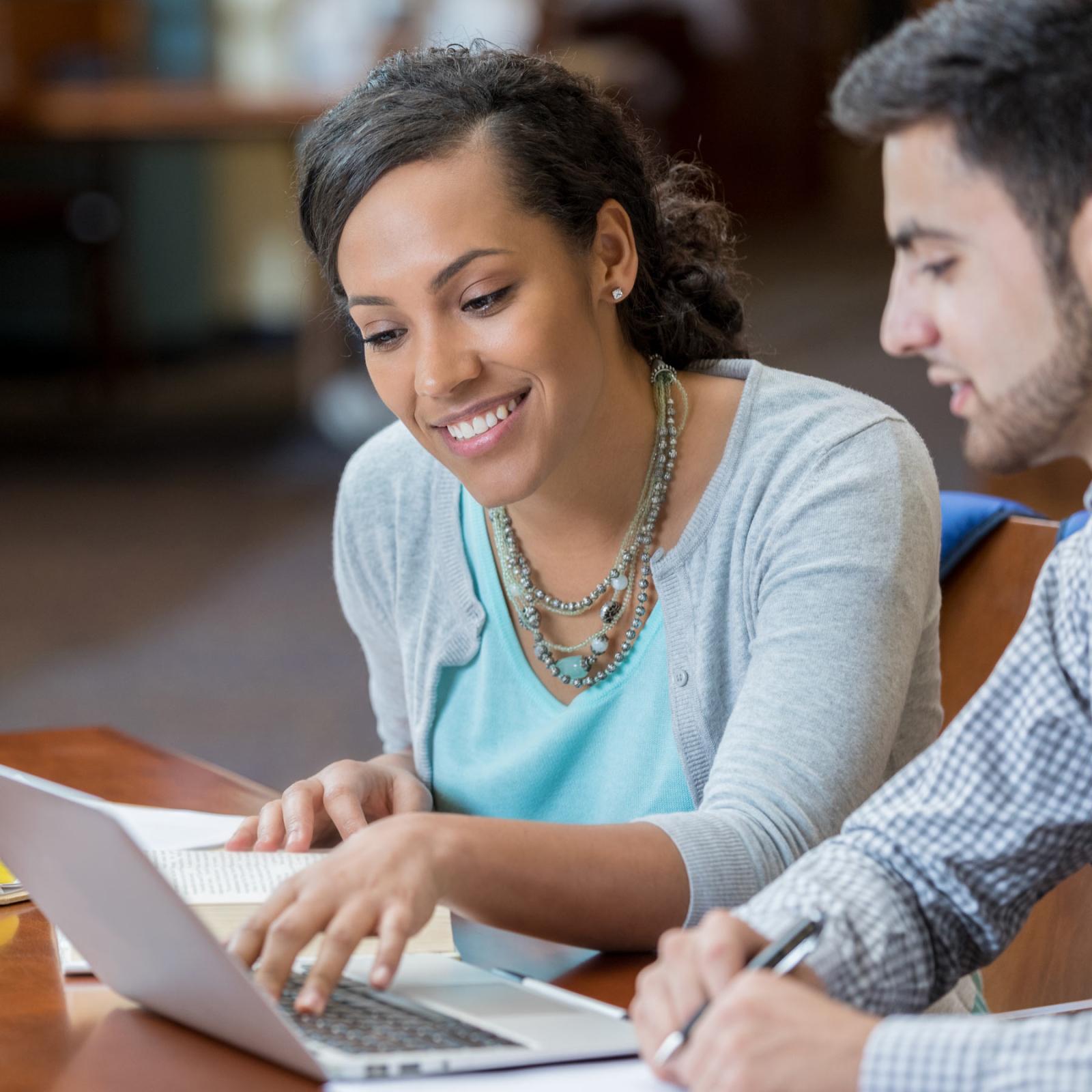 Elisabeth Haub school of Law students at laptop