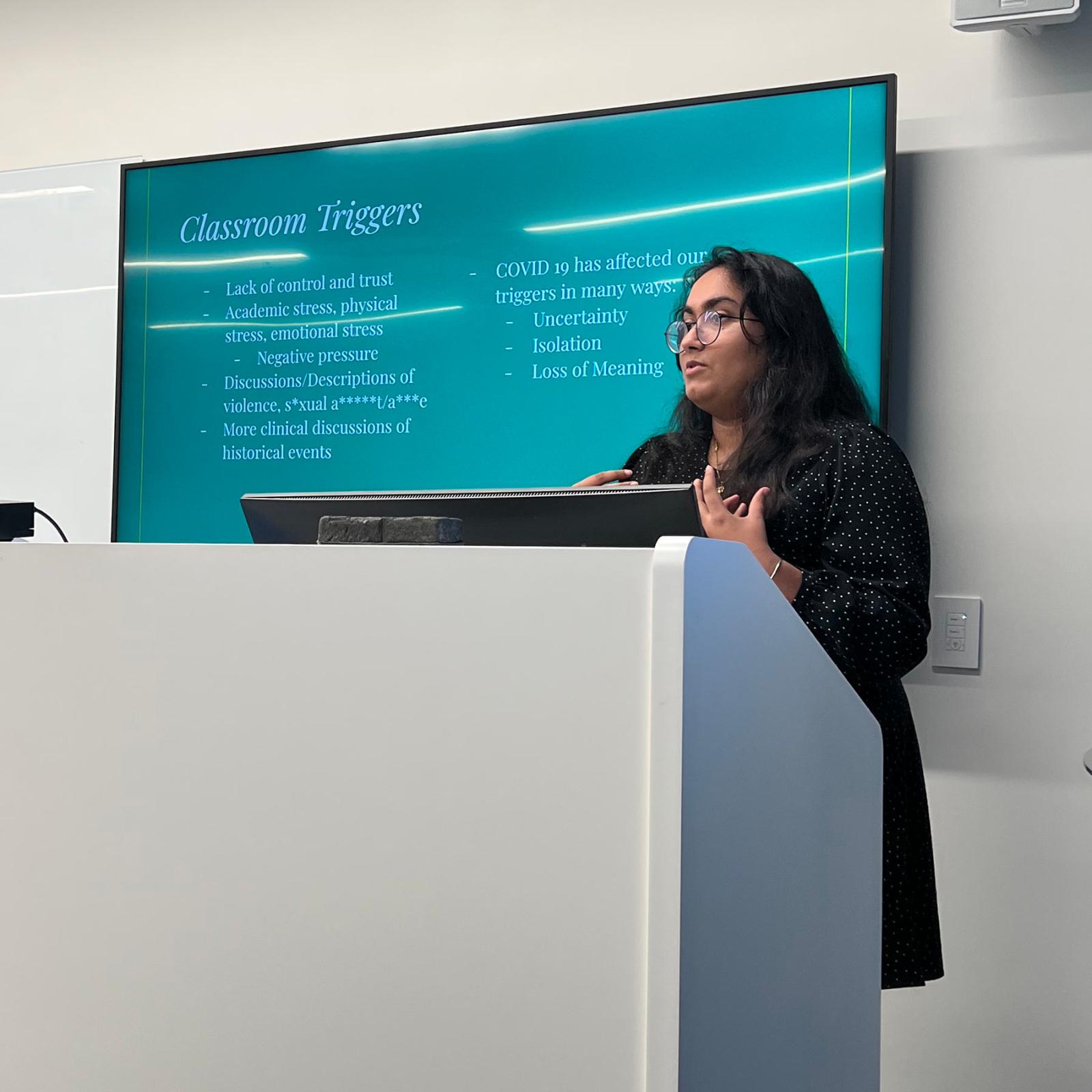 Pace student presenting at a Social Justice event.