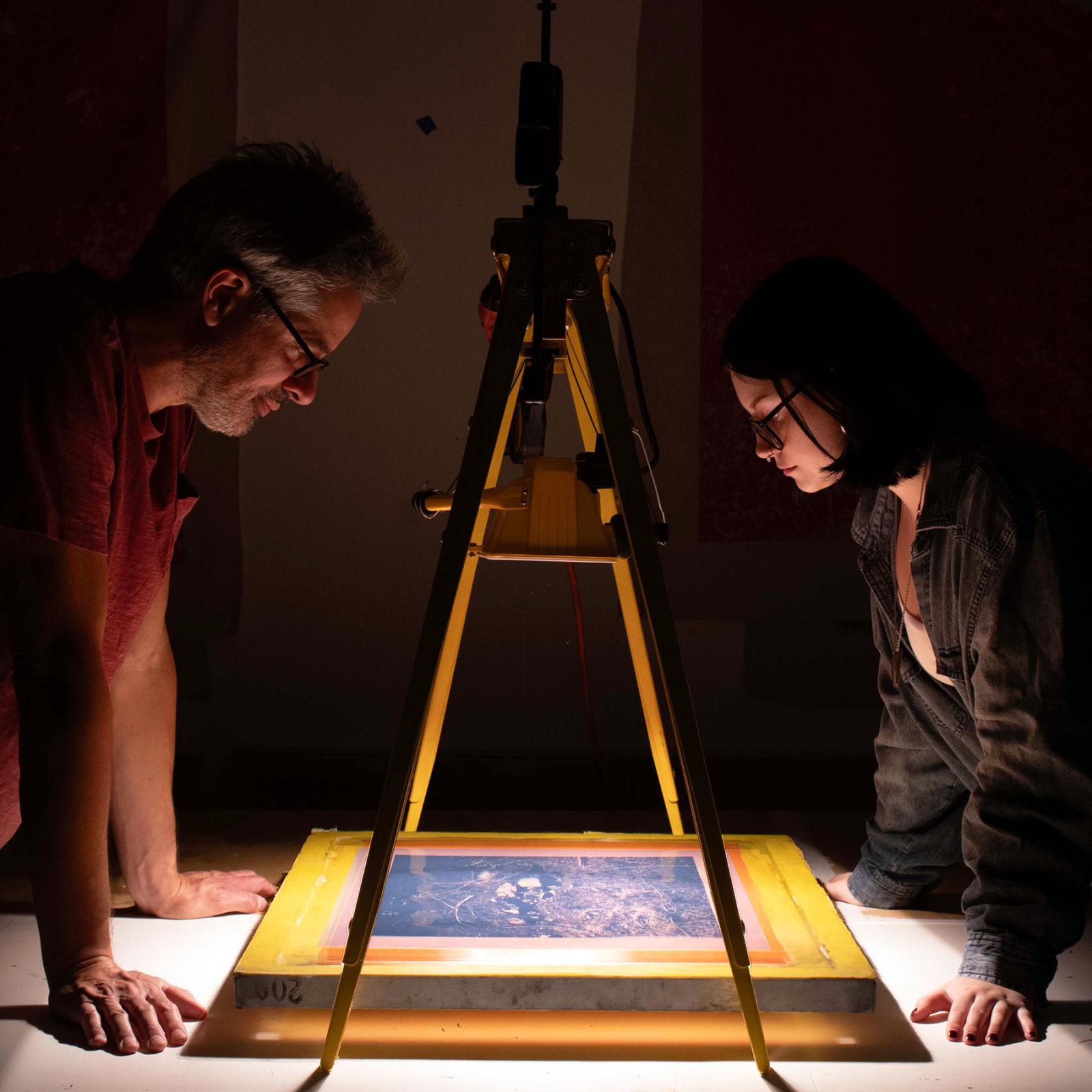 Pace University's Art professor Derek Stroup and Film and Screen Studies student Katie Romanyshyn working together on artwork made possible by the Amelia A. Gould Undergraduate Research Assistantship