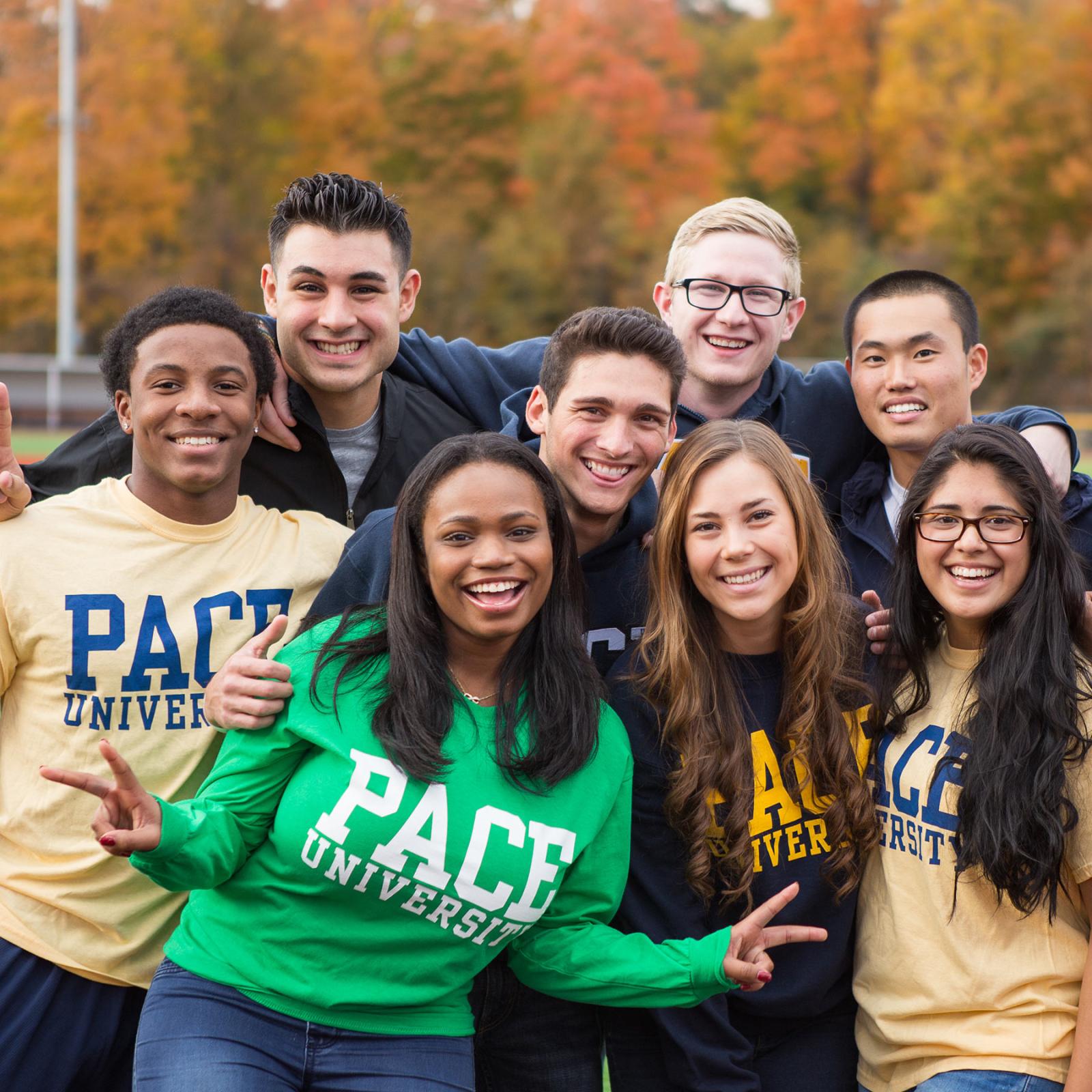 Group of Pace students smiling at the camera.