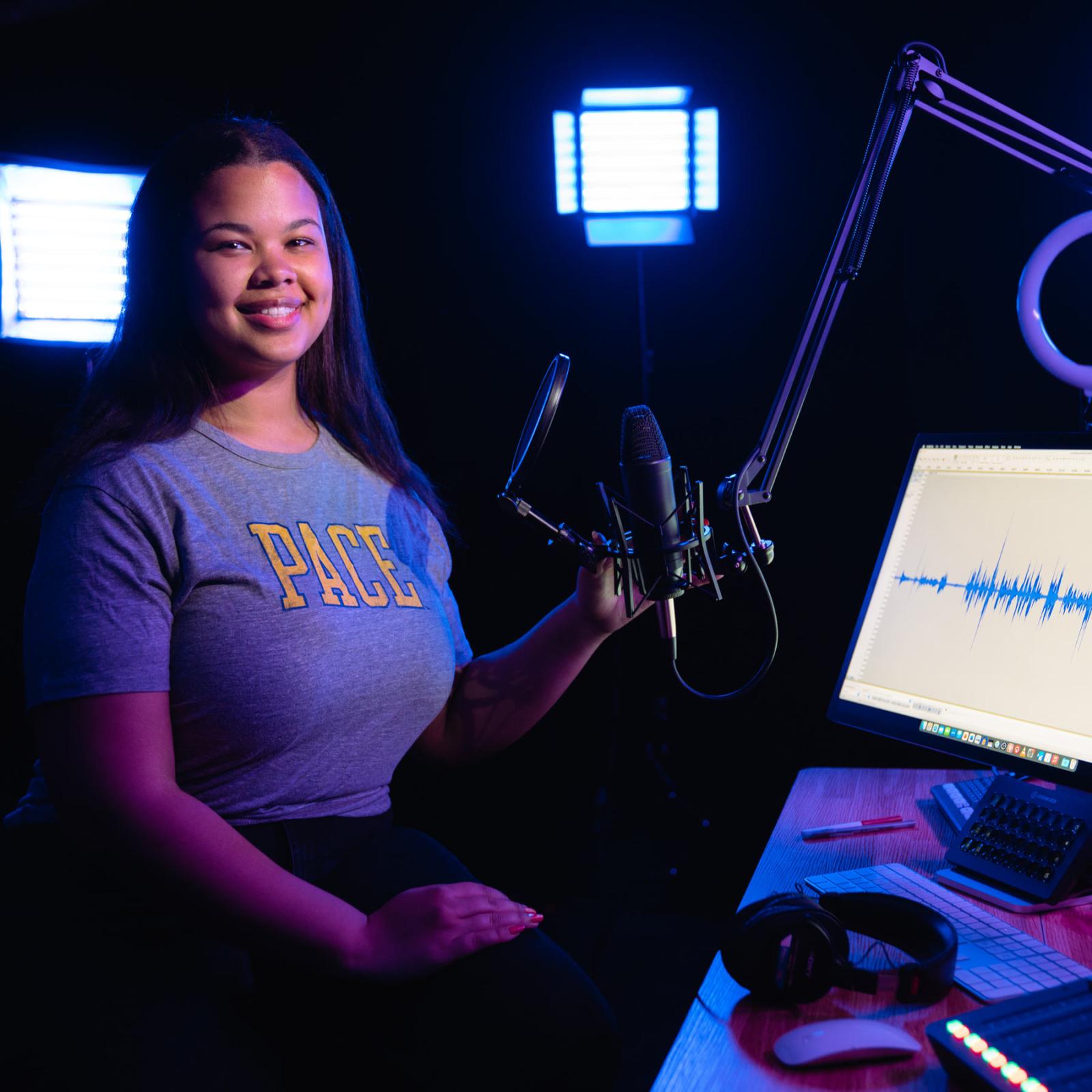 Sands College of Performing Arts student, jasmine pardue in a voice over recording studio