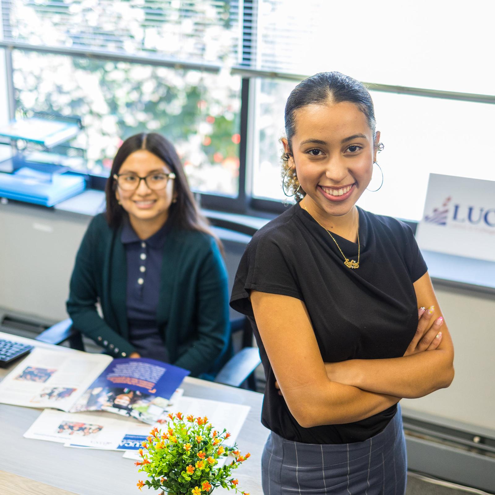 Two ELI students in an office at Pace University
