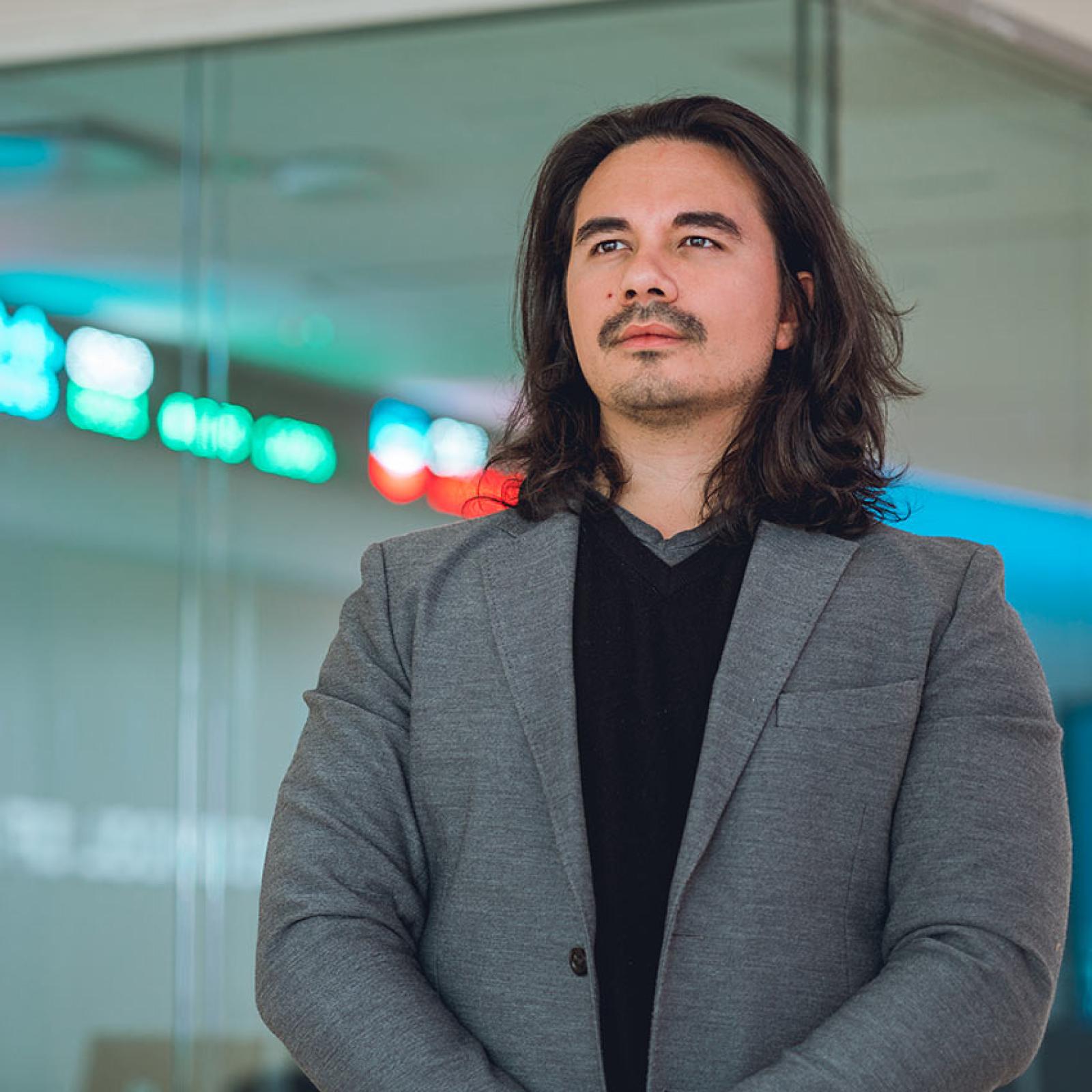 A Pace University student looks at the stock market reporting