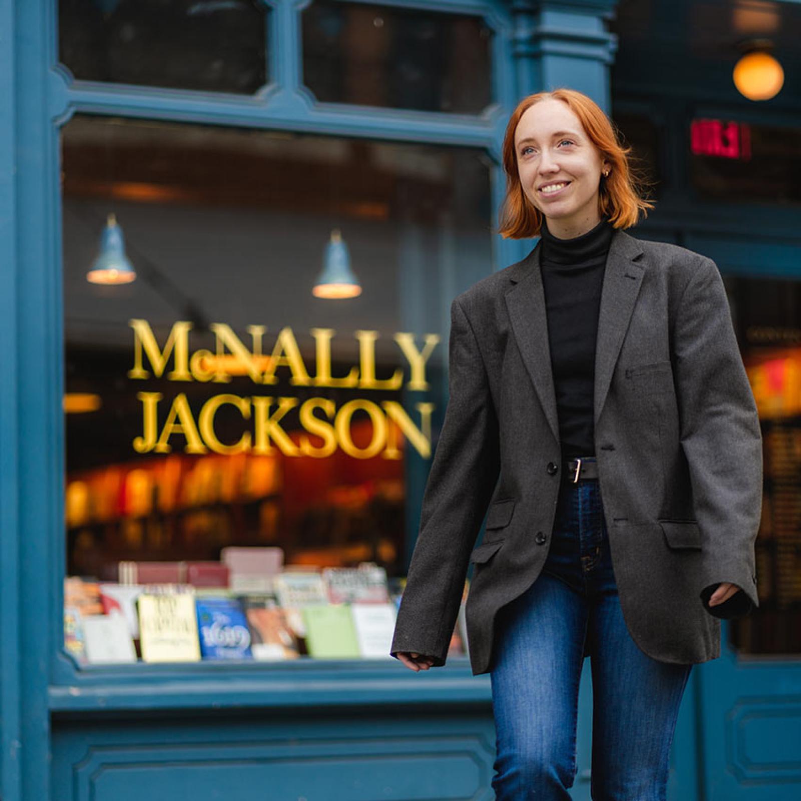 A Pace student exits a bookstore 