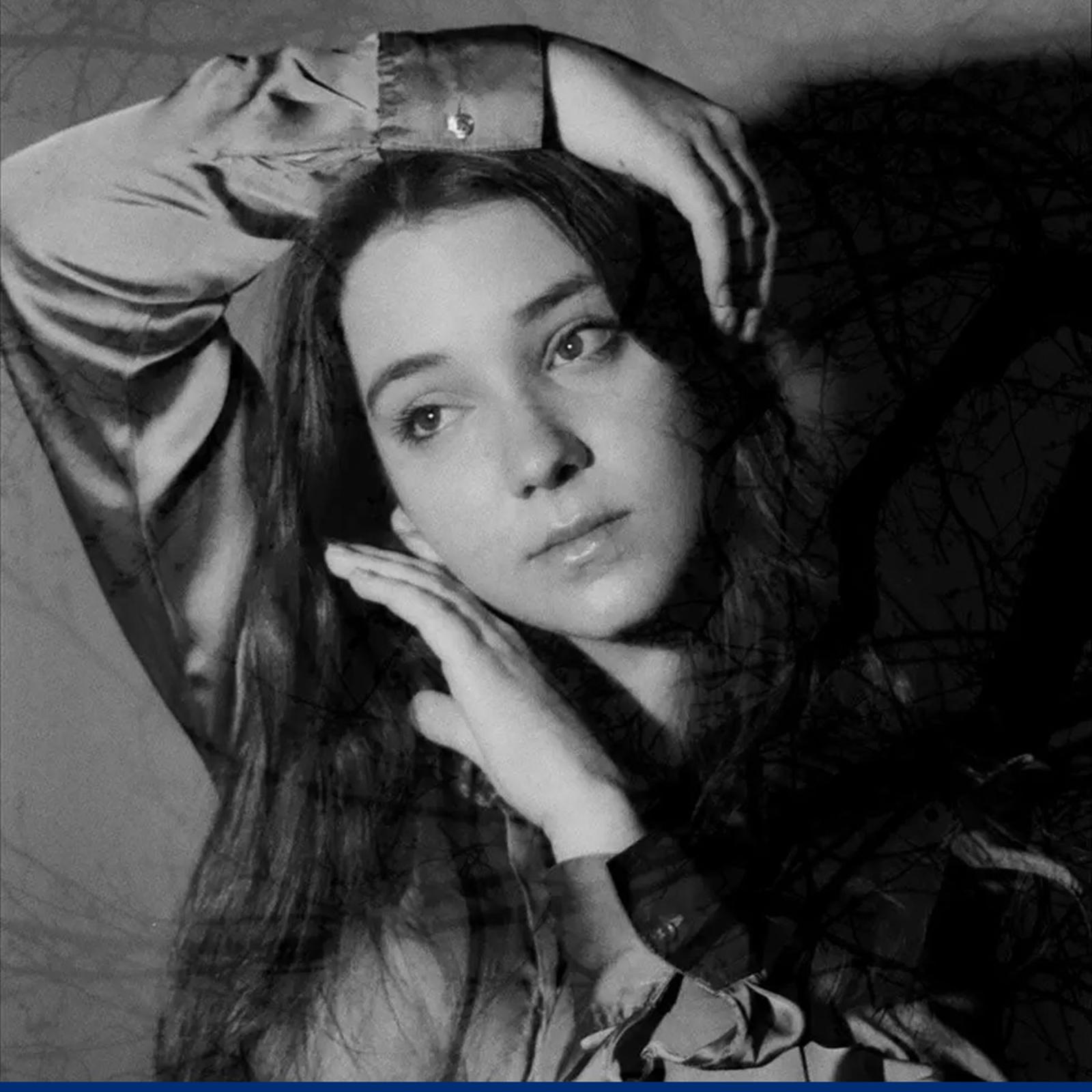 Pace University Film and Screen Studies student Veronika Orlovska posing with her hands near her face
