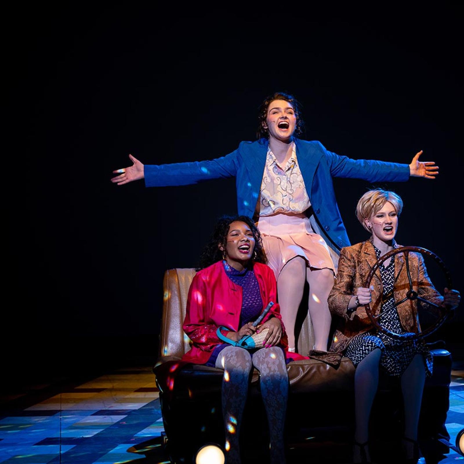 Three students performing in a musical theater production at Pace University's Sands College of Performing Arts